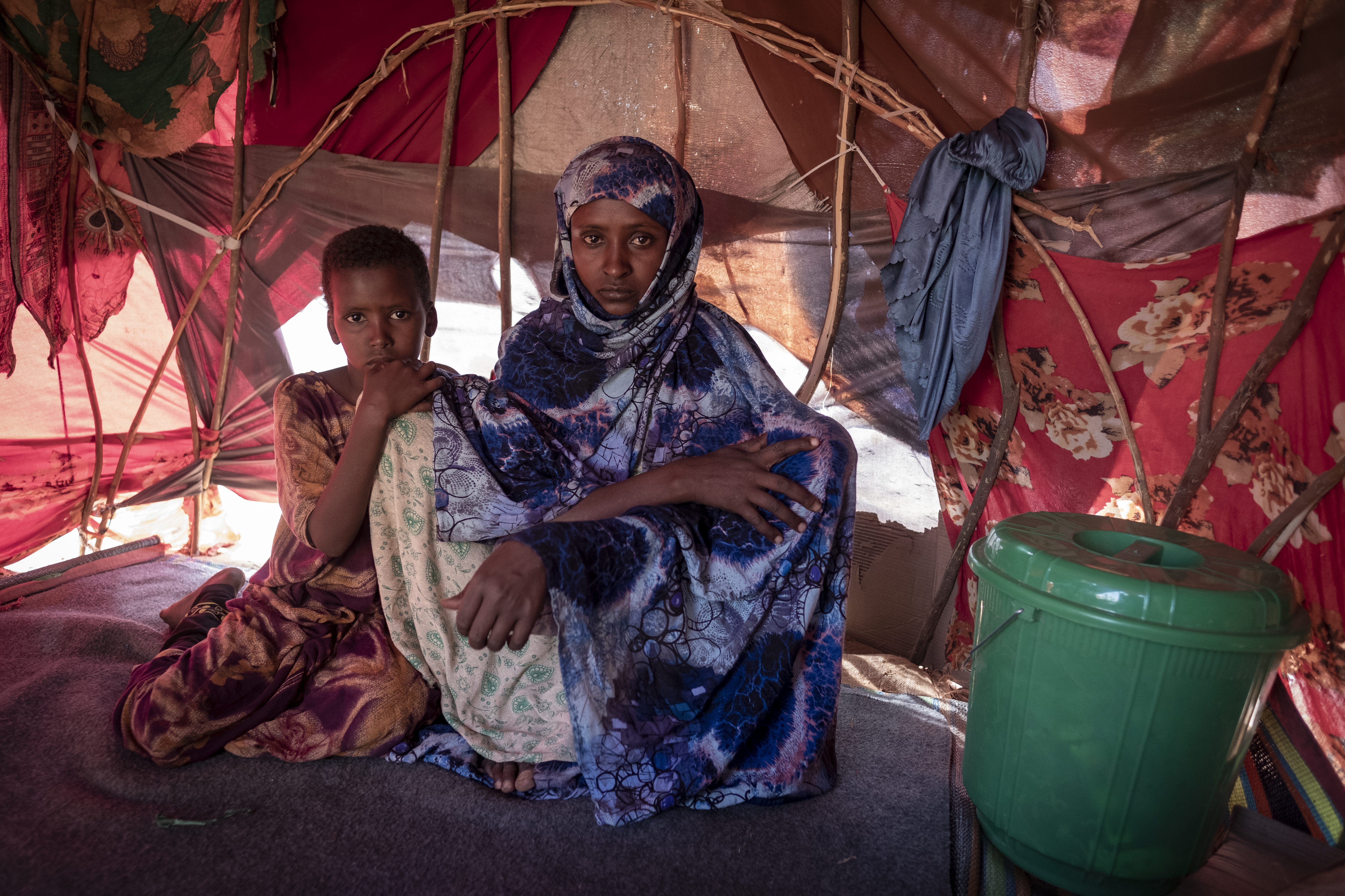 Fatuma Mohamed aged 30 with her daughter Naney Adam Abdi aged 8 yrs have been in the makeshift IDP camp in Dollow, Somalia