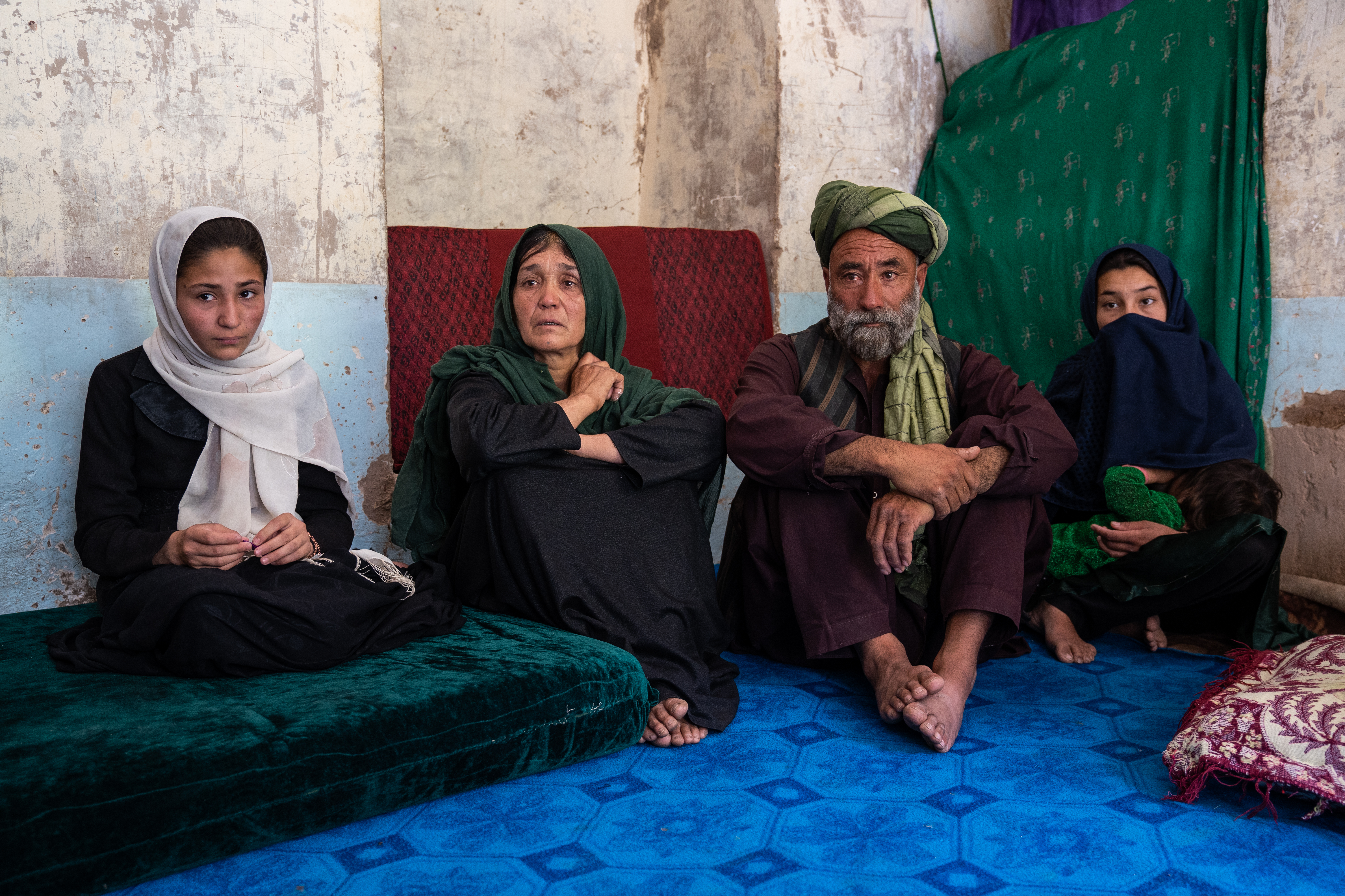 An Afghan family grieving the death of their teenage daughter who was murdered