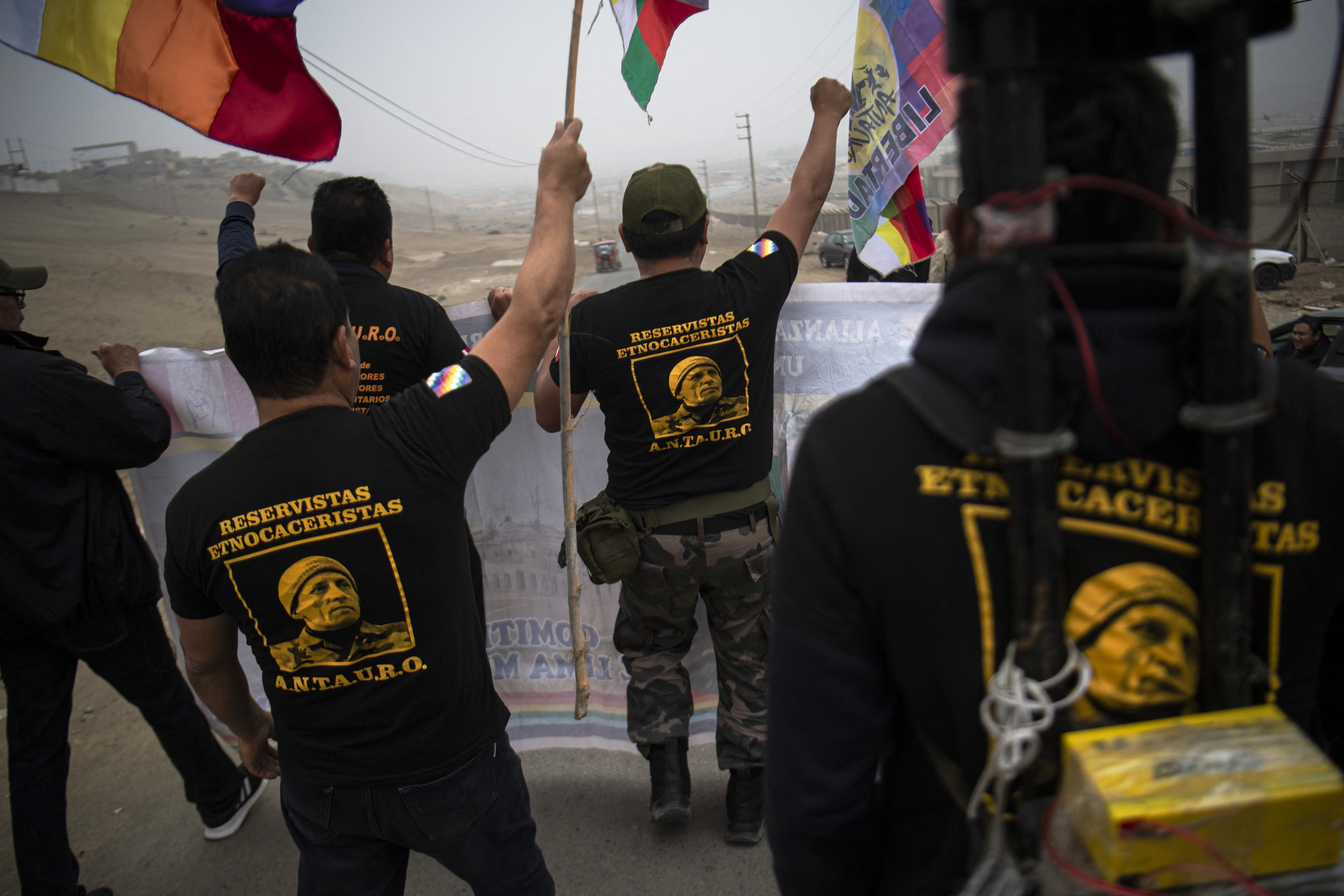 Supporters of Humala and the Ethnocacerist movement stand outside of a prison in Lima, Peru.