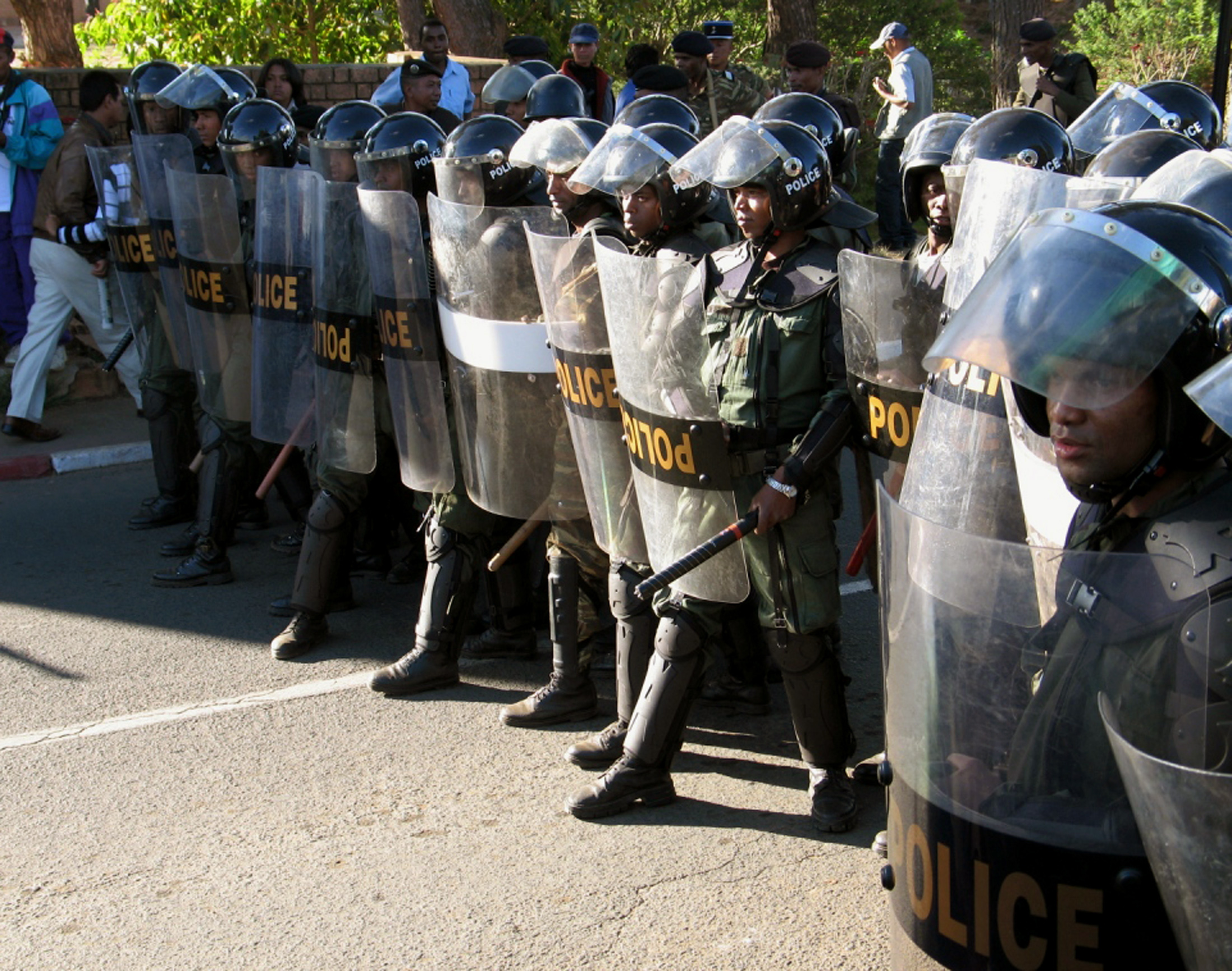 Riot police stand guard in Madagscar