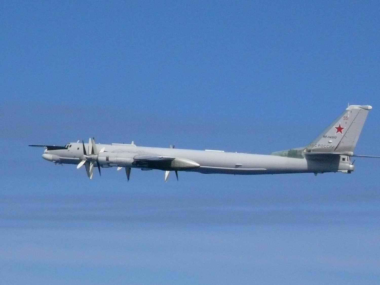 A Russian TU-95 bomber flies over East China Sea in this handout picture taken by Japan Air Self-Defence Force and released by the Joint Staff Office of the Defense Ministry of Japan
