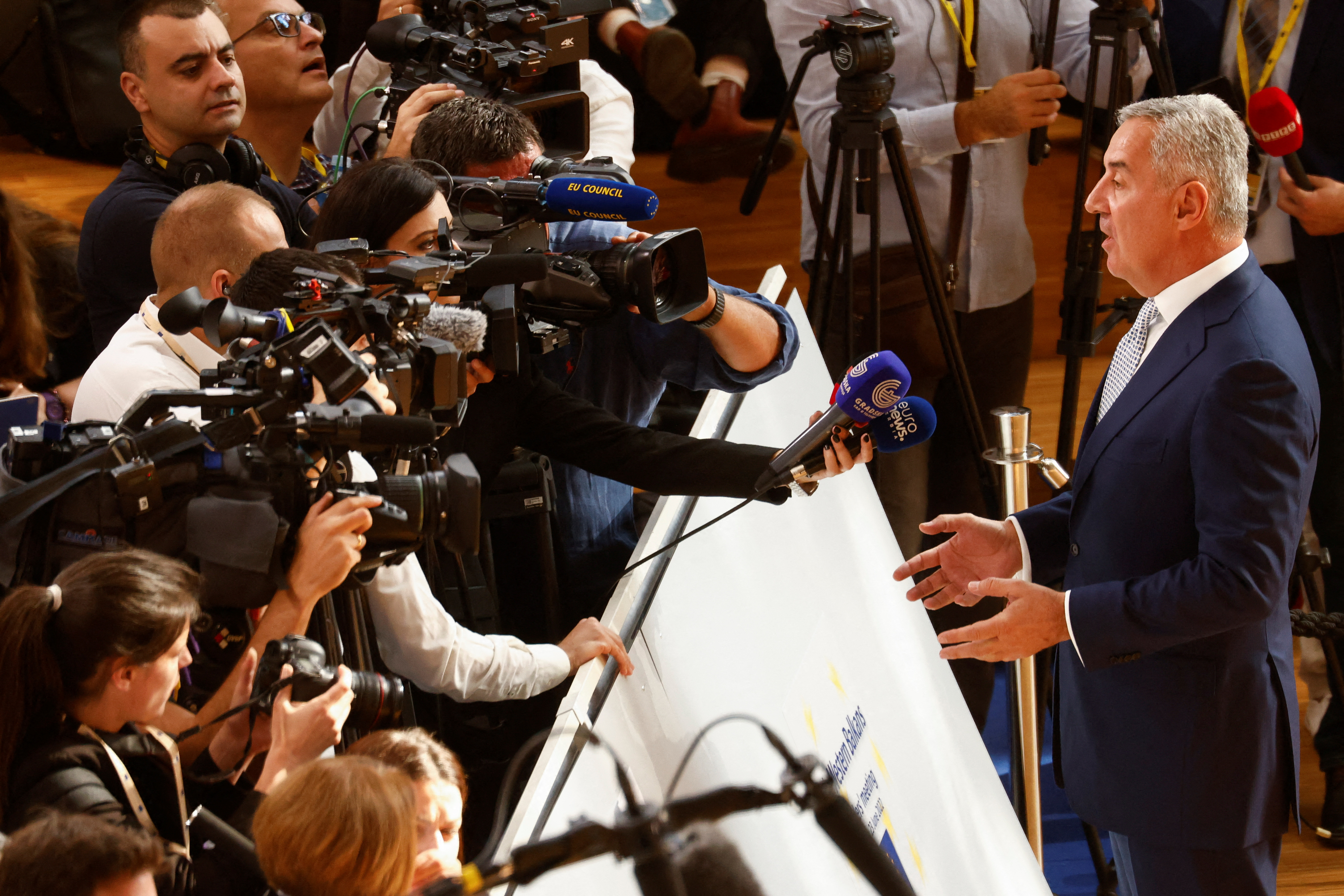 Montenegro's President Milo Dukanovic speaks to the media