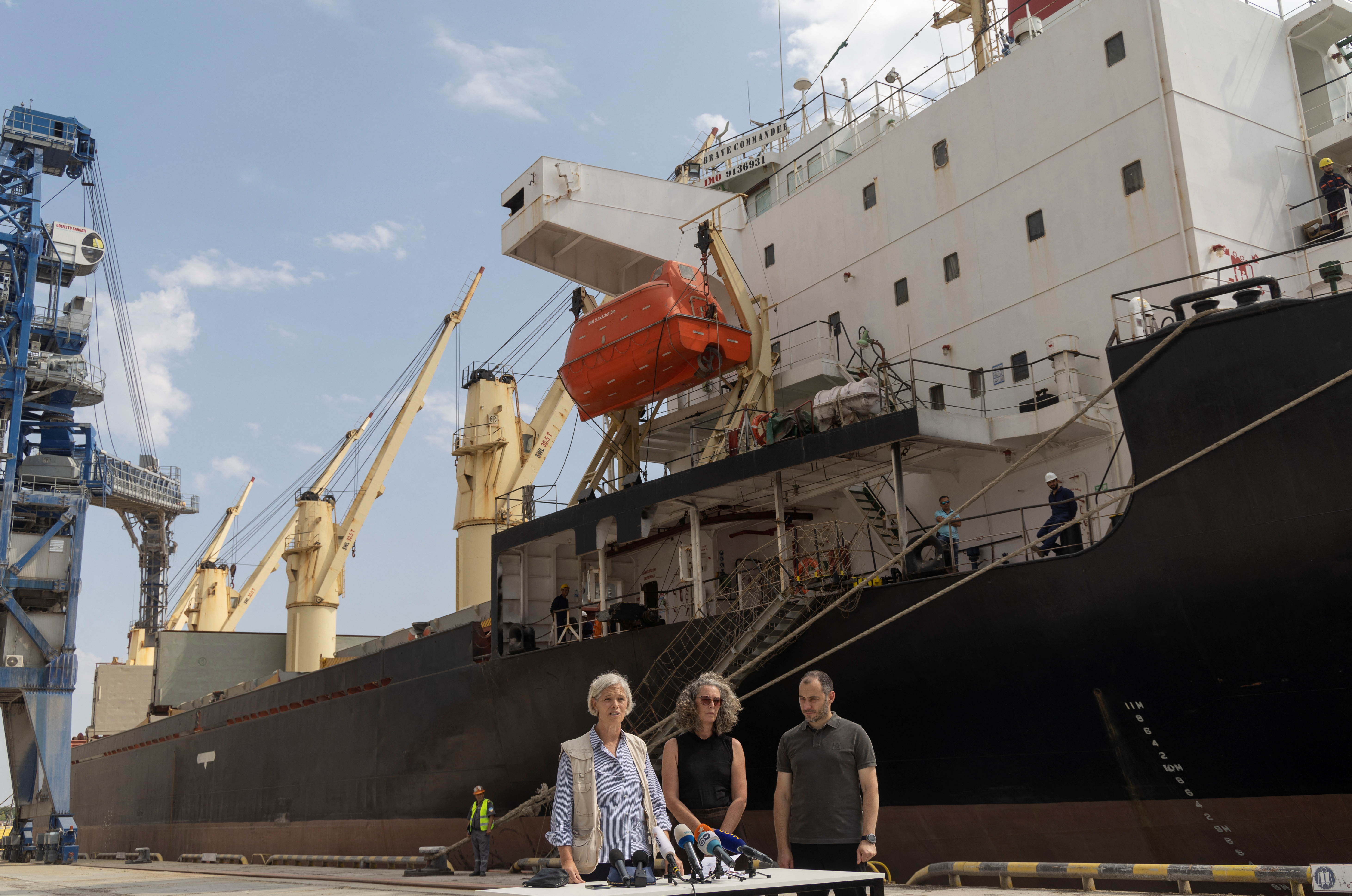 United Nations official Denise Brown, Deputy Country Director at World Food Programme Marianne Ward and Ukraine's Infrastructure minister Oleksandr Kubrakov attend a news briefing in font of the bulk carrier Brave Commander.