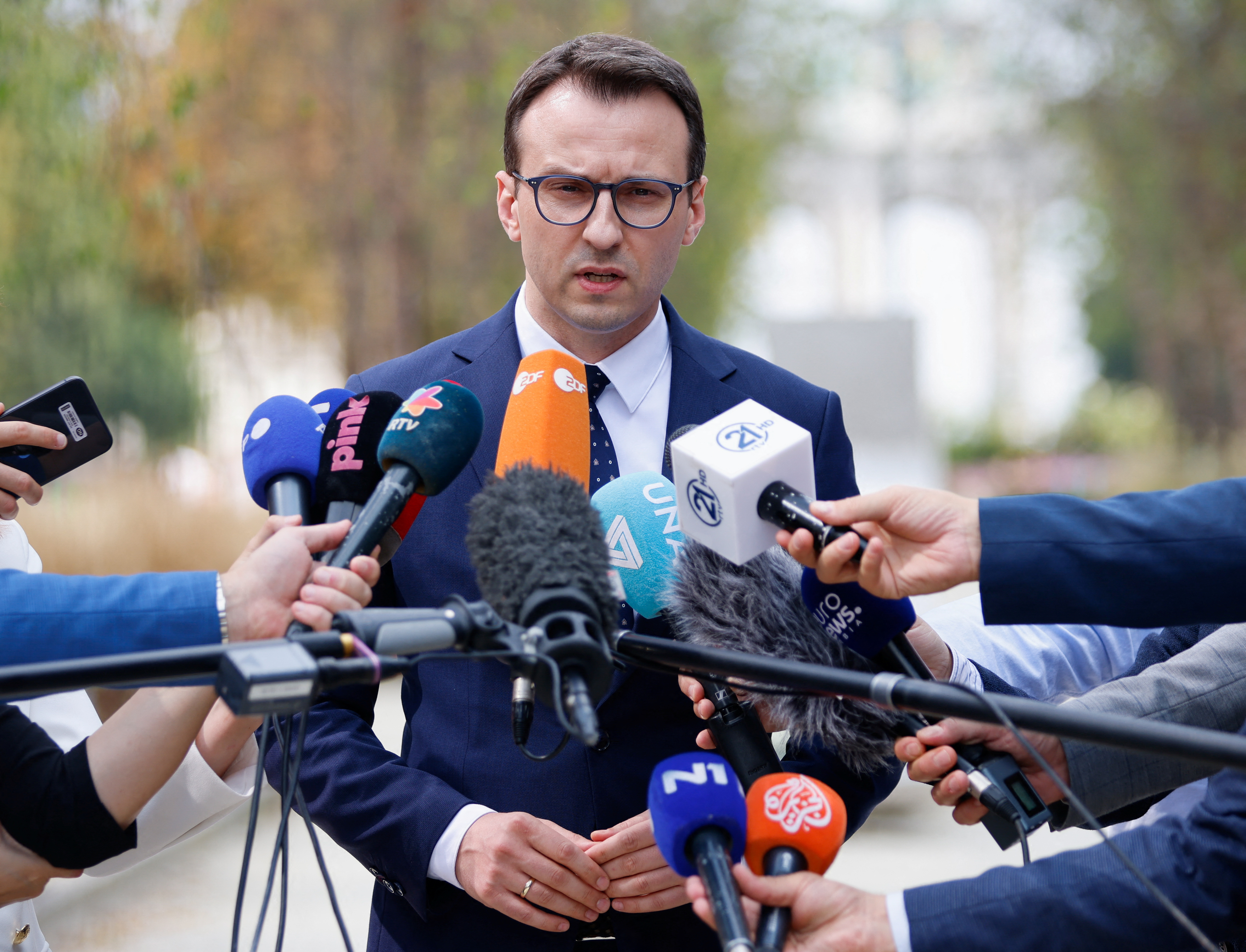 The head of the Serbian government's Office for Kosovo, Petar Petkovic speaks to the media in Brussels