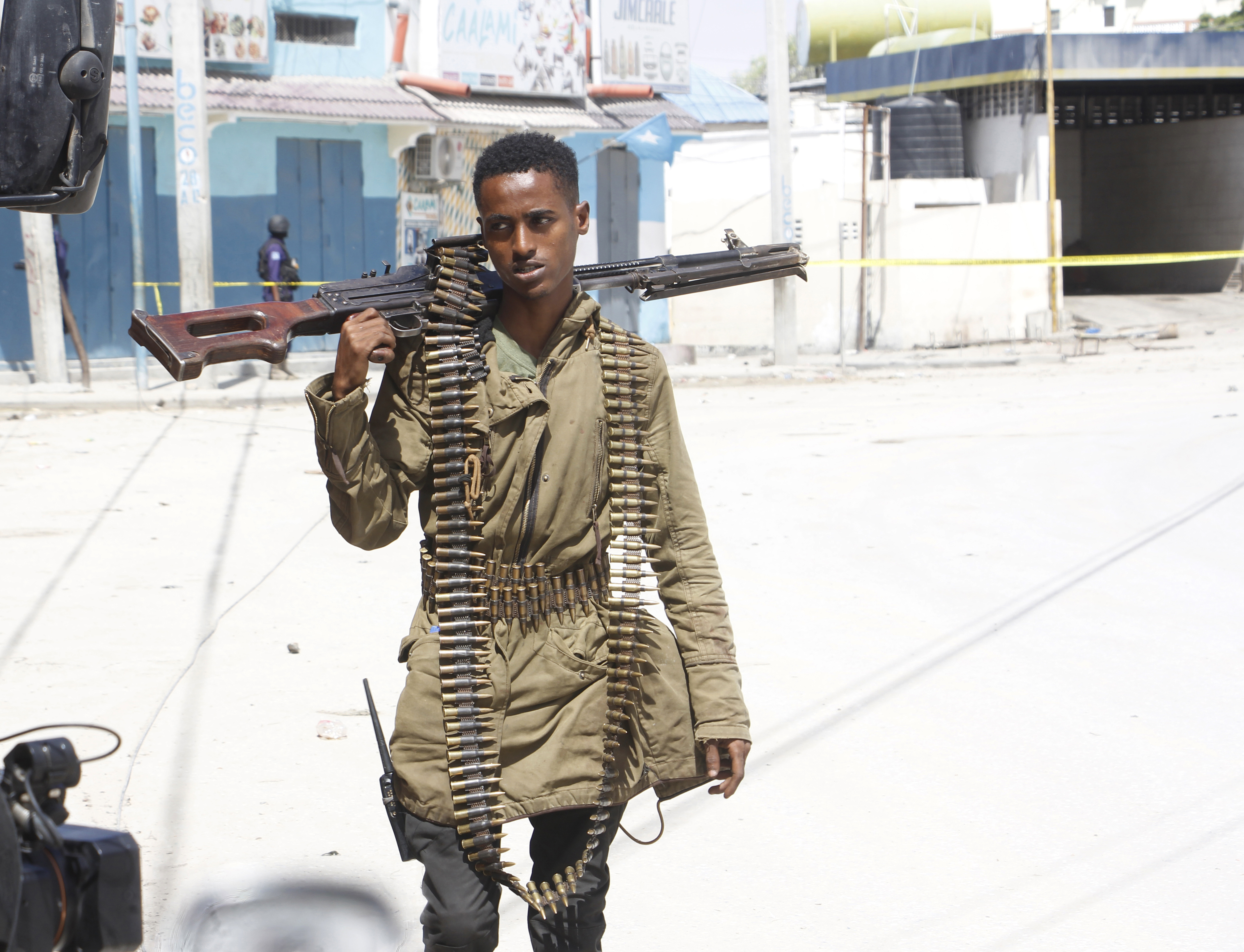 A soldier patrols outside the Hayat Hotel in Mogadishu, Somalia.