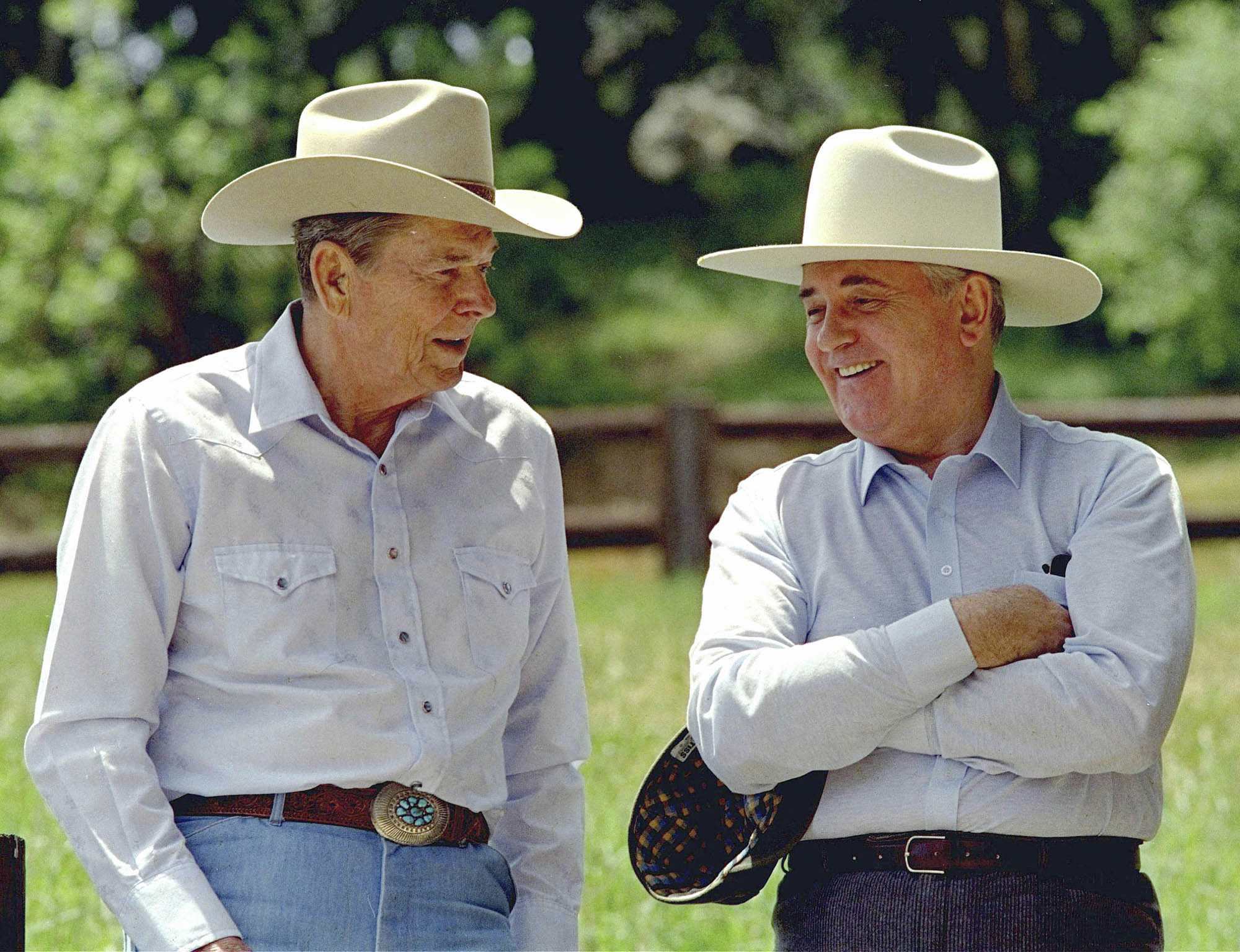 Ronald Reagan and Mikhail Gorbachev, dressed in cowboy hats at Reagan's California ranch in 1992