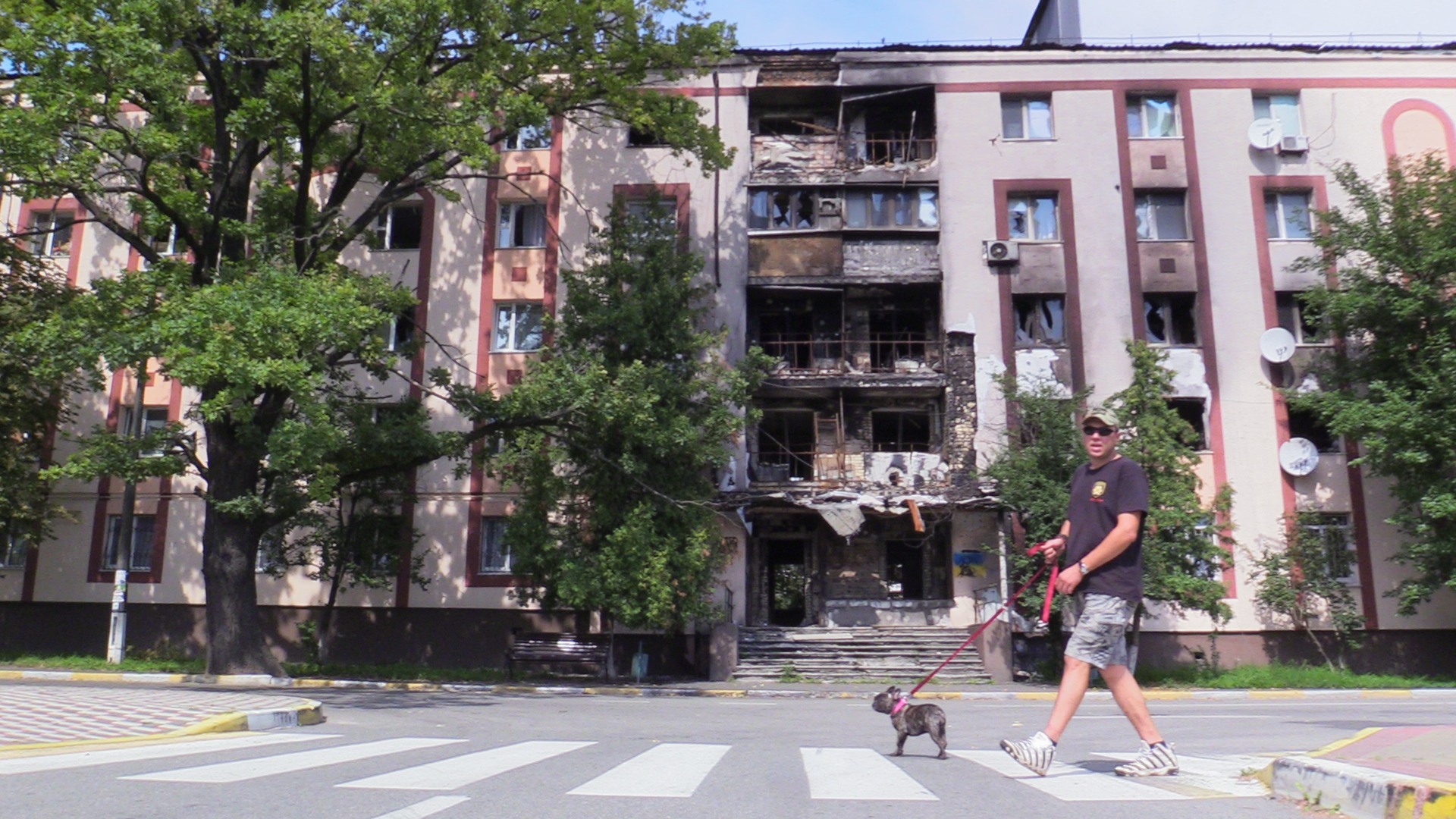 Bogdan Yavorsky shows a spot in Bucha where he fought 'kadyrovtsy' forces on February 27