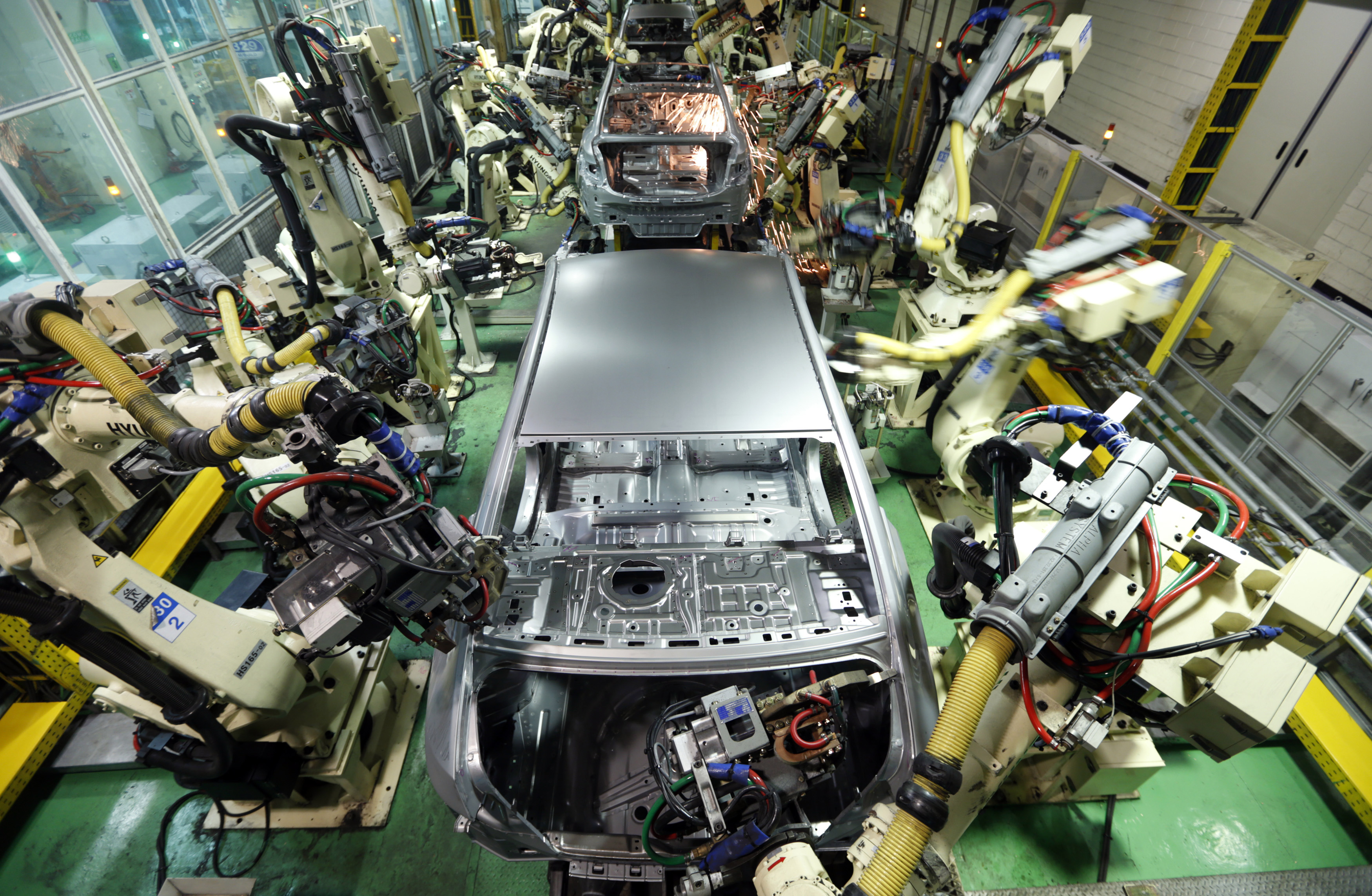 A sedan being assembled in a Hyundai factory in Asan, South Korea.
