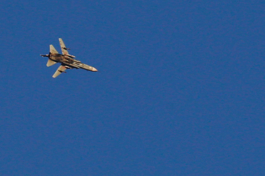 A war jet flies above Syria near the Israeli Syrian border as it is seen from the Israeli-occupied Golan Heights on July 23, 2018 [File: Ronen Zvulun/Reuters]
