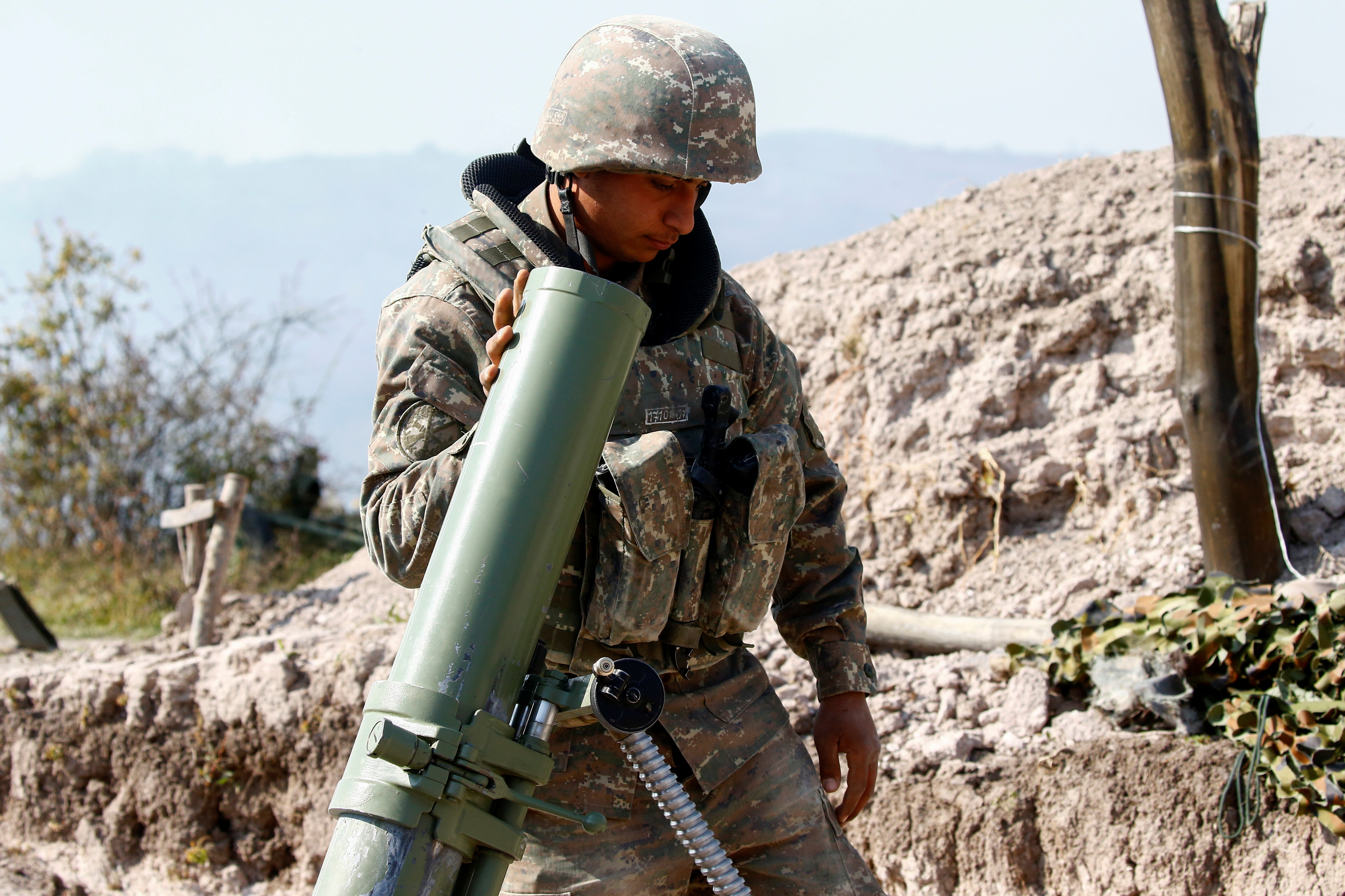 An Armenian soldier is seen manning a frontline position in Nagorno-Karabakh