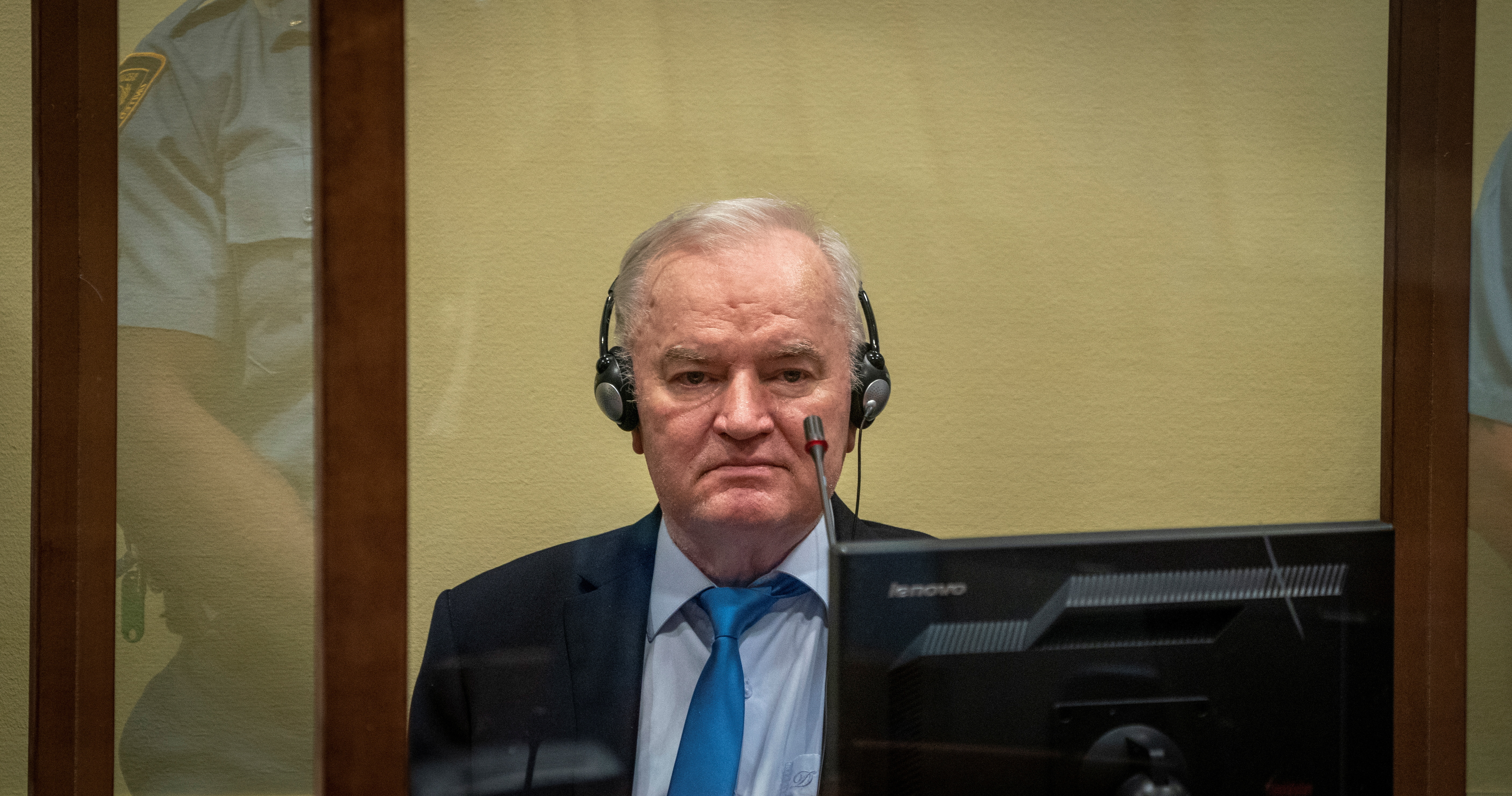 Former Bosnian Serb military leader Ratko Mladic sits in court.