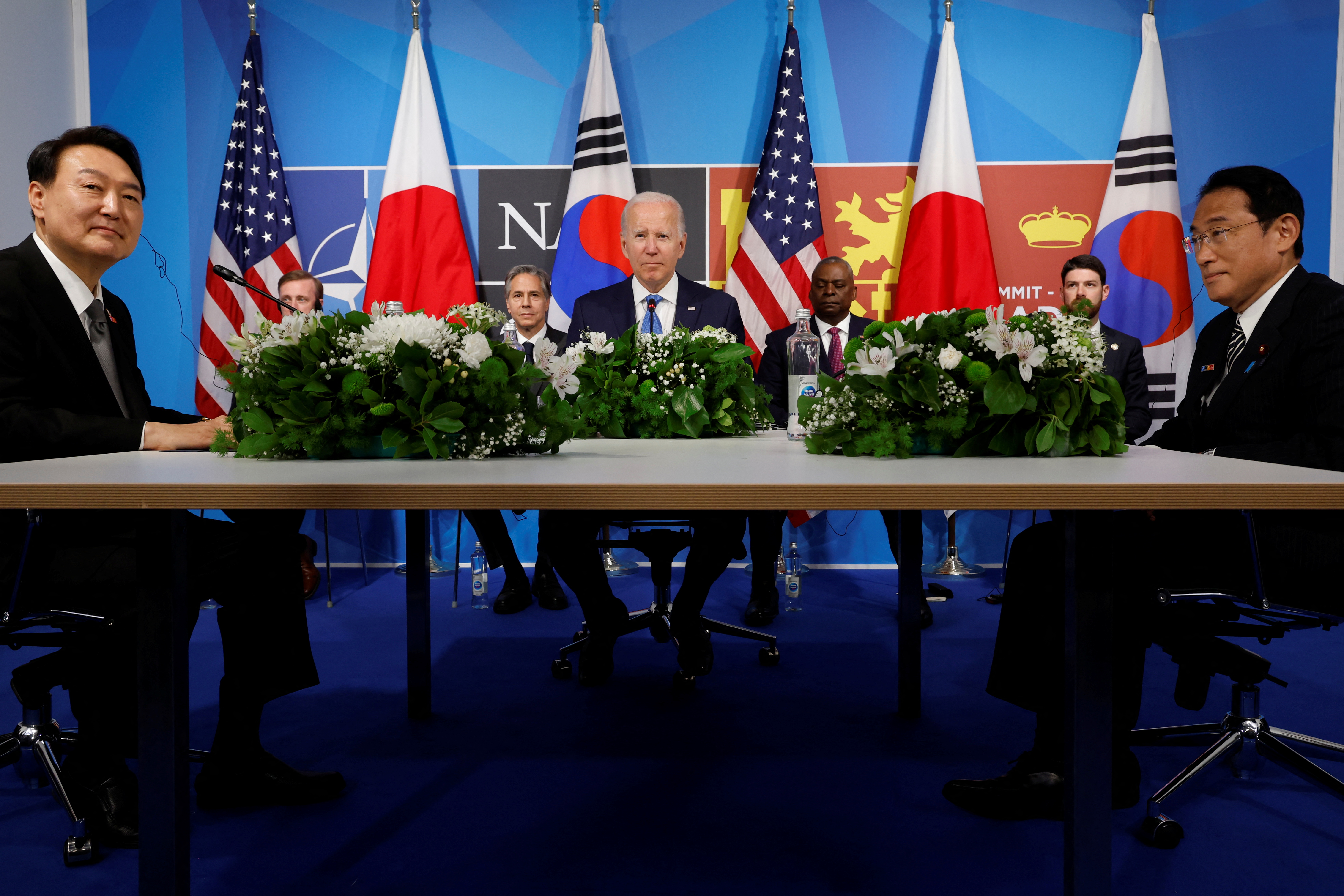 US President Joe Biden, US Secretary of State Antony Blinken, US Defense Secretary Lloyd Austin, South Korea's President Yoon Suk-yeol and Japanese Prime Minister Fumio Kishida meet during a NATO summit in Madrid, Spain, June 29, 2022. 