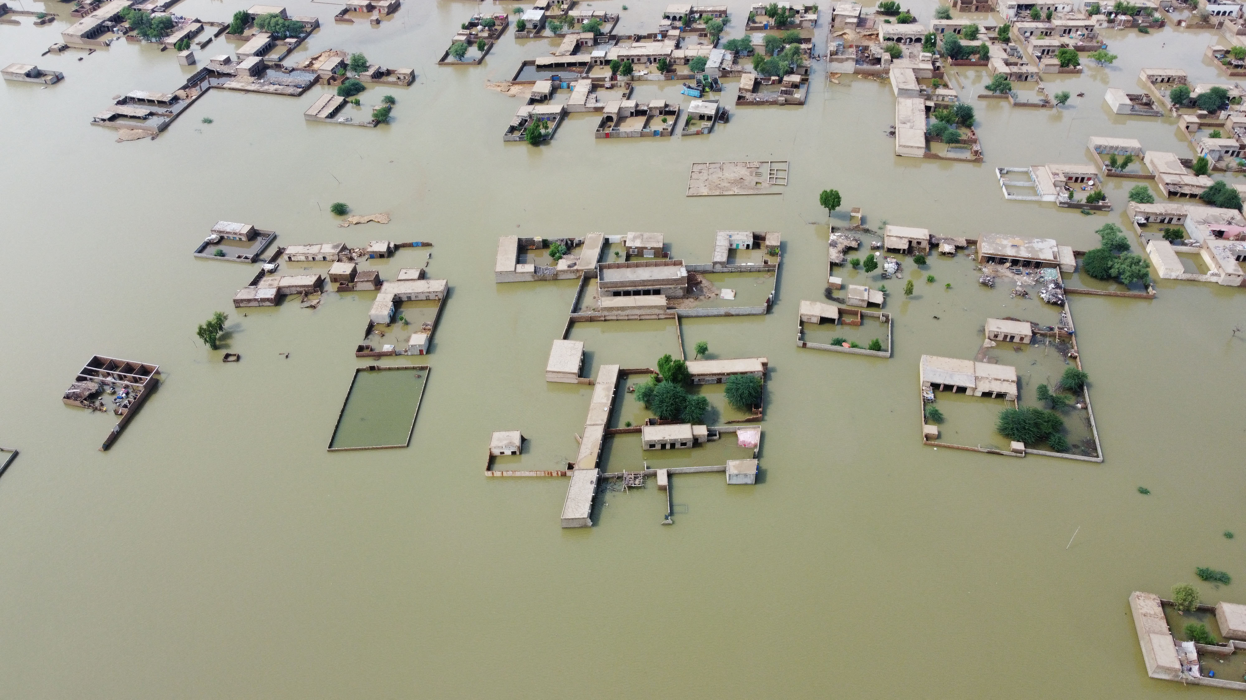 Submerged houses, following rains and floods during the monsoon season, in Dera Allah Yar, Jafferabad, Pakistan.