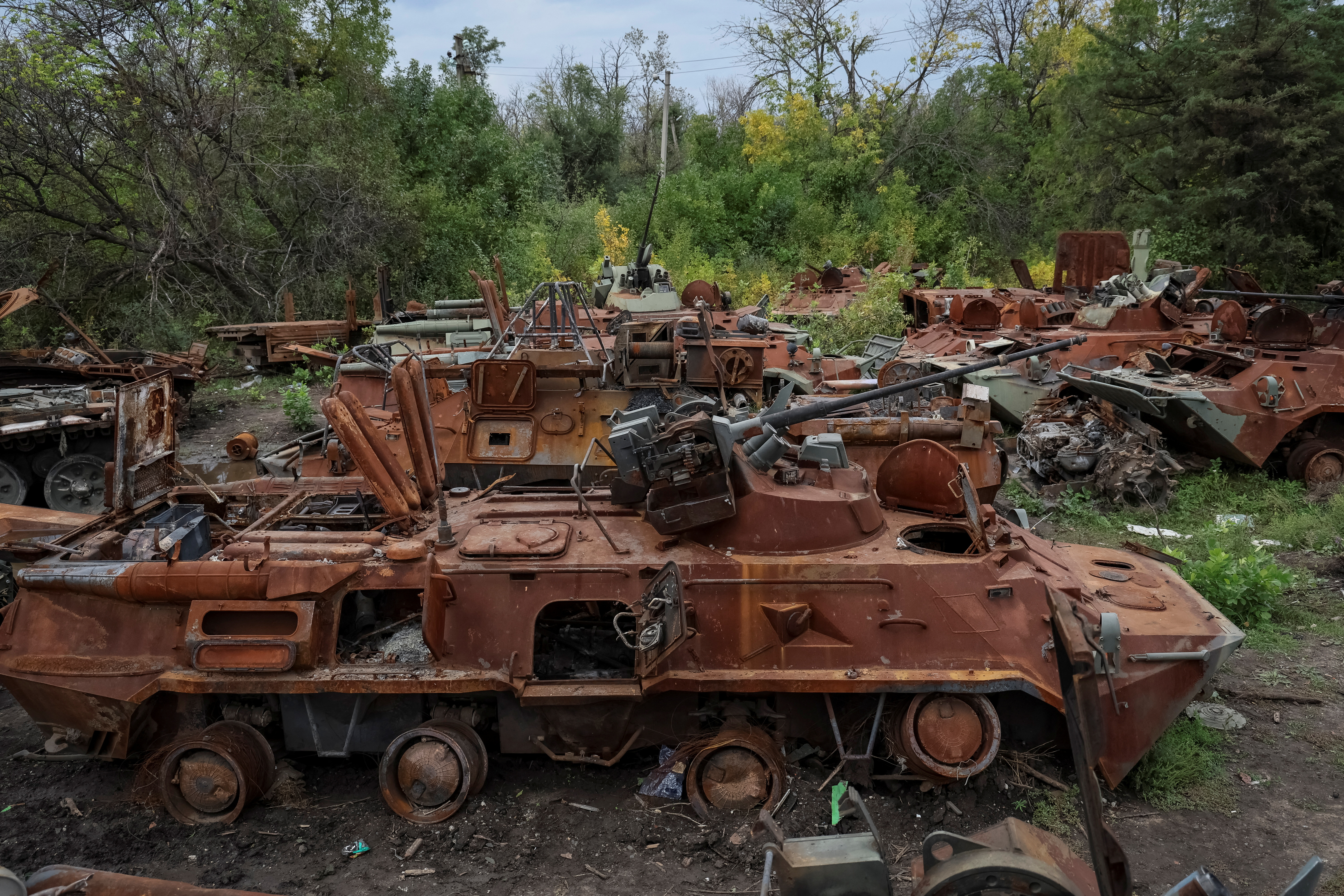 Destroyed Russian Armoured Personnel Carriers (APC) are seen, as Russia's attack on Ukraine continues, in the town of Izium, recently liberated by Ukrainian Armed Forces, in Kharkiv region, Ukraine September 20, 2022. REUTERS/Gleb Garanich