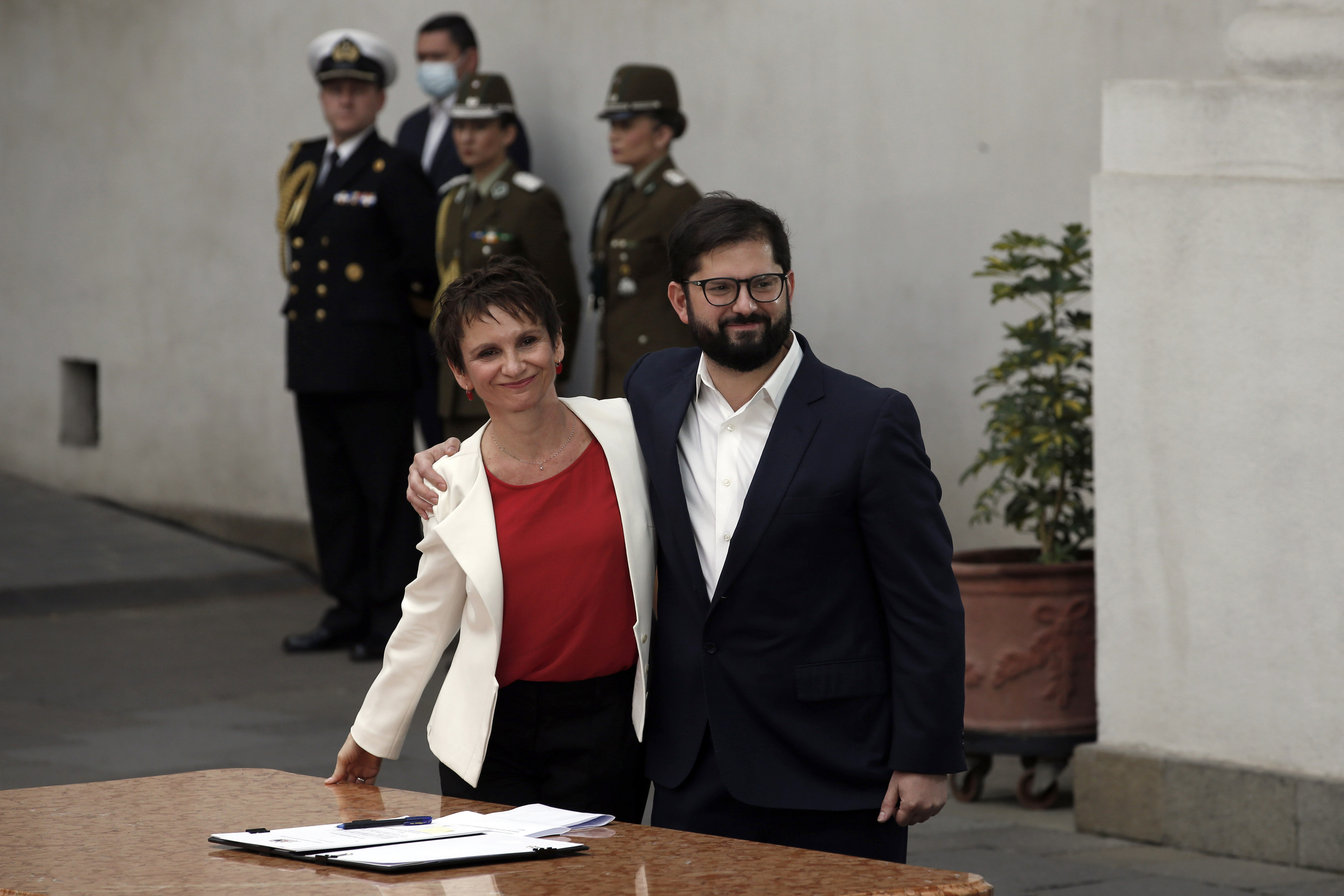 Boric poses with new Interior Minister Carolina Toha at La Moneda presidential palace in Santiago, Chile.