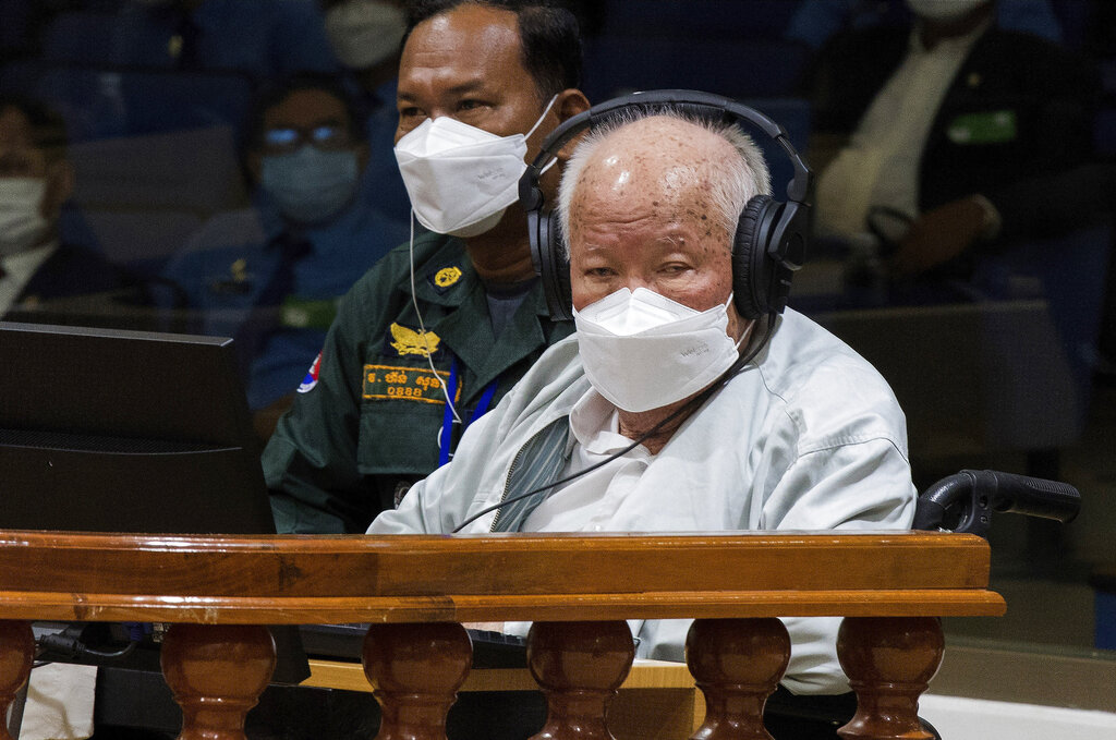 Khieu Samphan, (right), at the UN-backed war crimes tribunal in Phnom Penh, Cambodia, on Thursday, September. 22, 2022 [Nhet Sok Heng/Extraordinary Chambers in the Courts of Cambodia via AP]