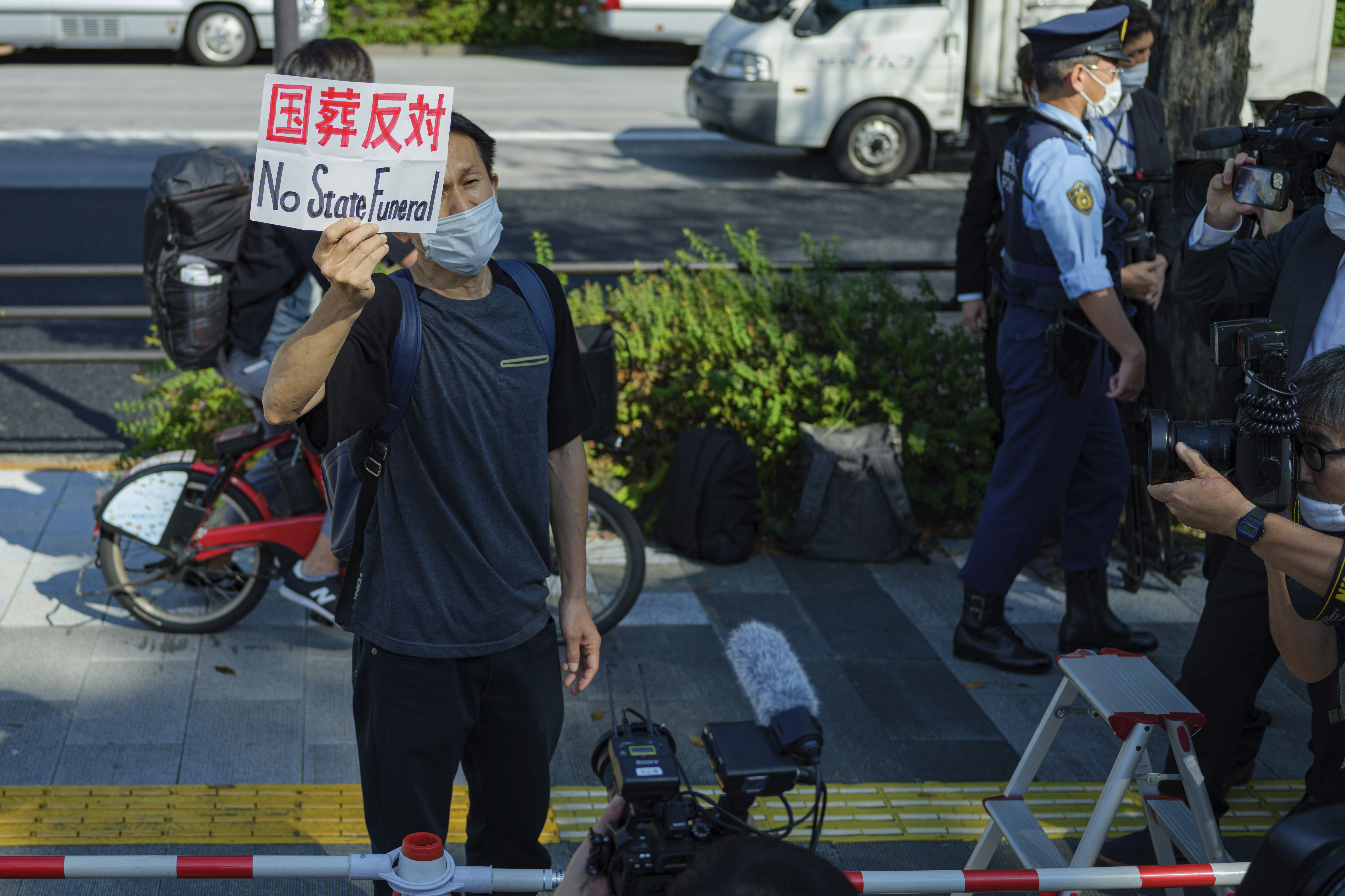 Tense Japan holds funeral for assassinated ex-leader Abe