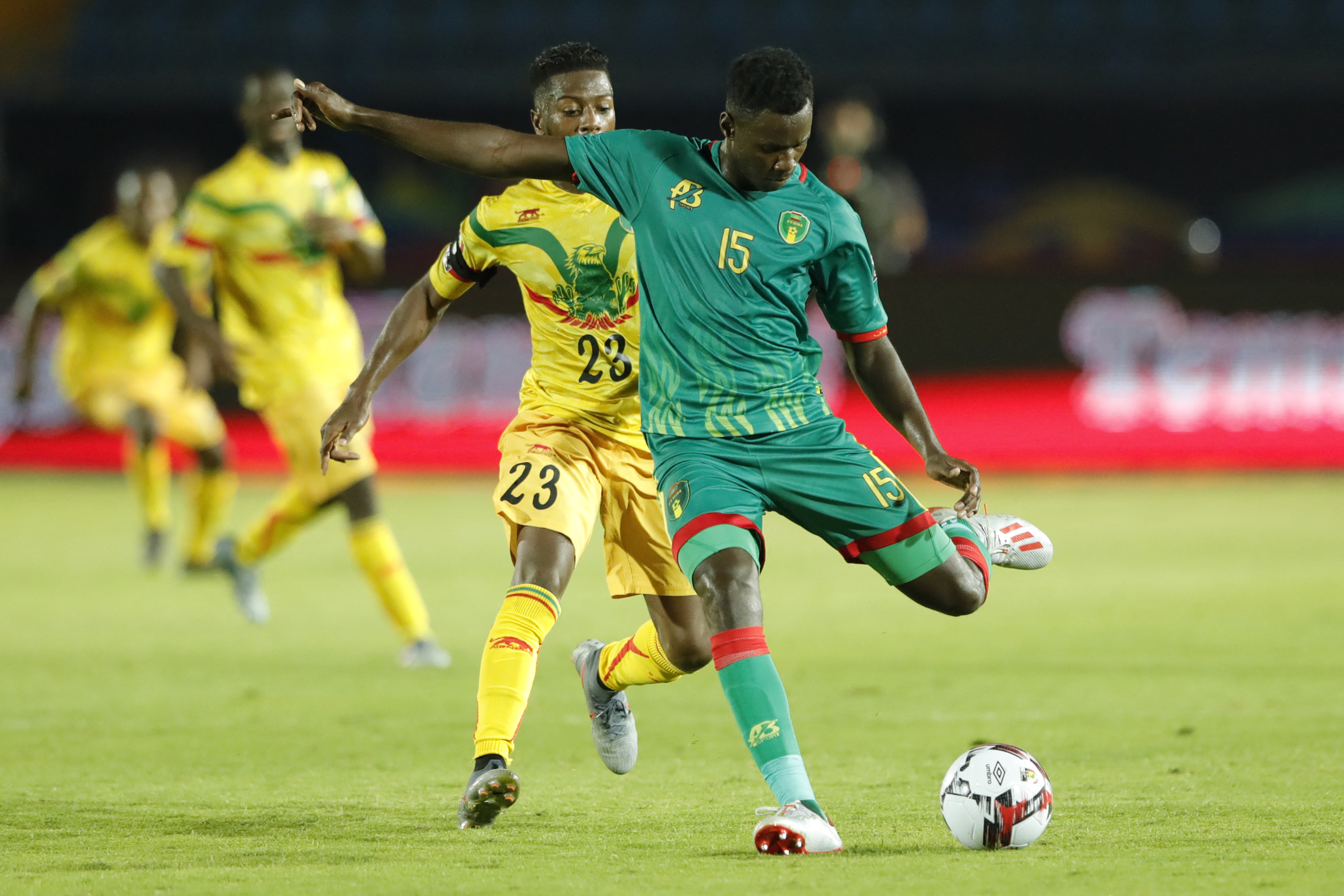 Mauritania's defender Bakary Ndiaye (R) is marked by Mali's forward Abdoulaye Diaby during the 2019 Africa Cup of Nations (CAN) football match between Mali and Mauritania at the Suez Stadium in Suez on June 24, 2019.
