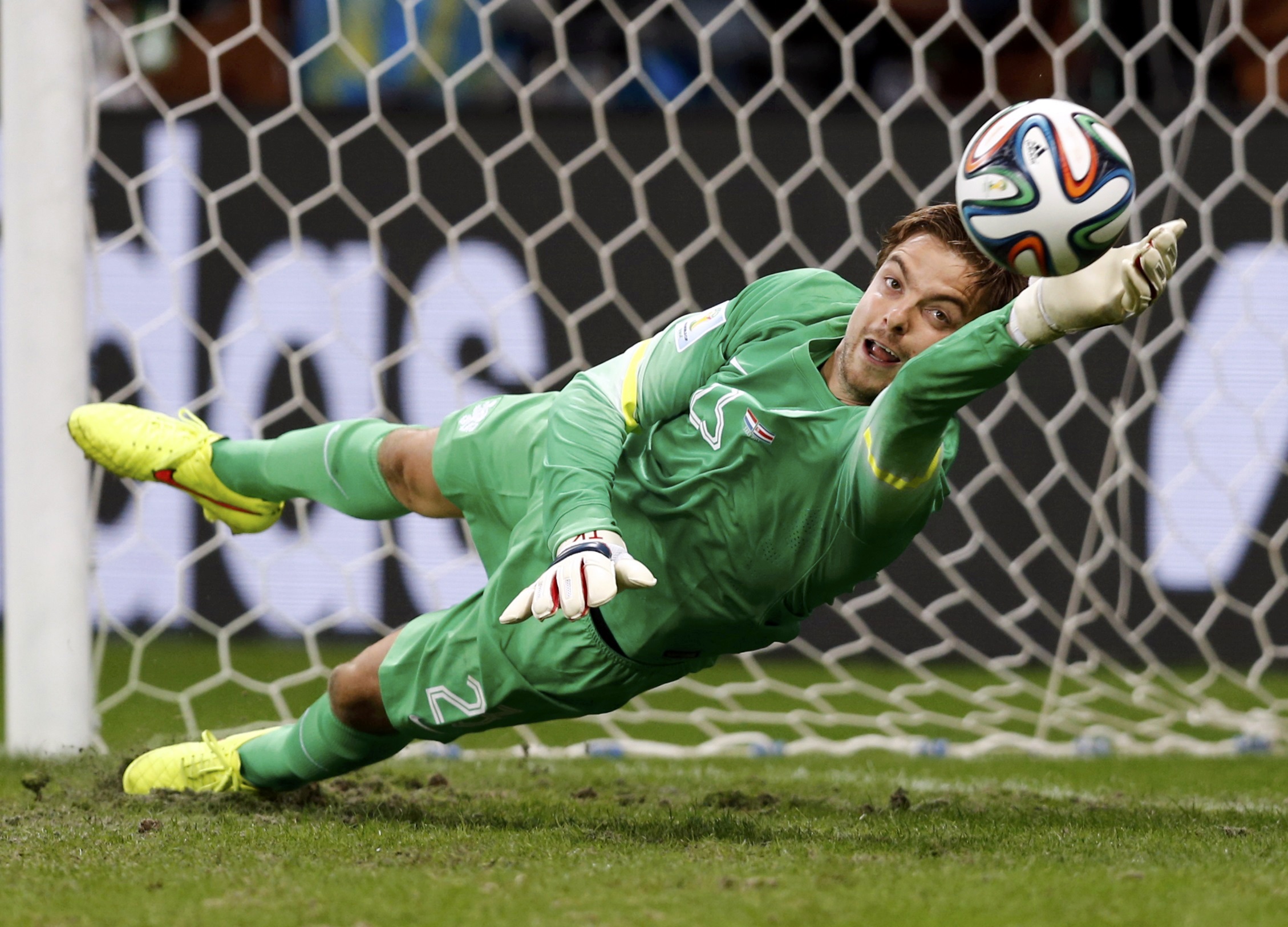 Goalkeeper Tim Krul of the Netherlands saves the last penalty shot against Costa Rica during a penalty shootout in their 2014 World Cup quarter-finals at the Fonte Nova arena in Salvador July 5, 2014. REUTERS/Marcos Brindicci 