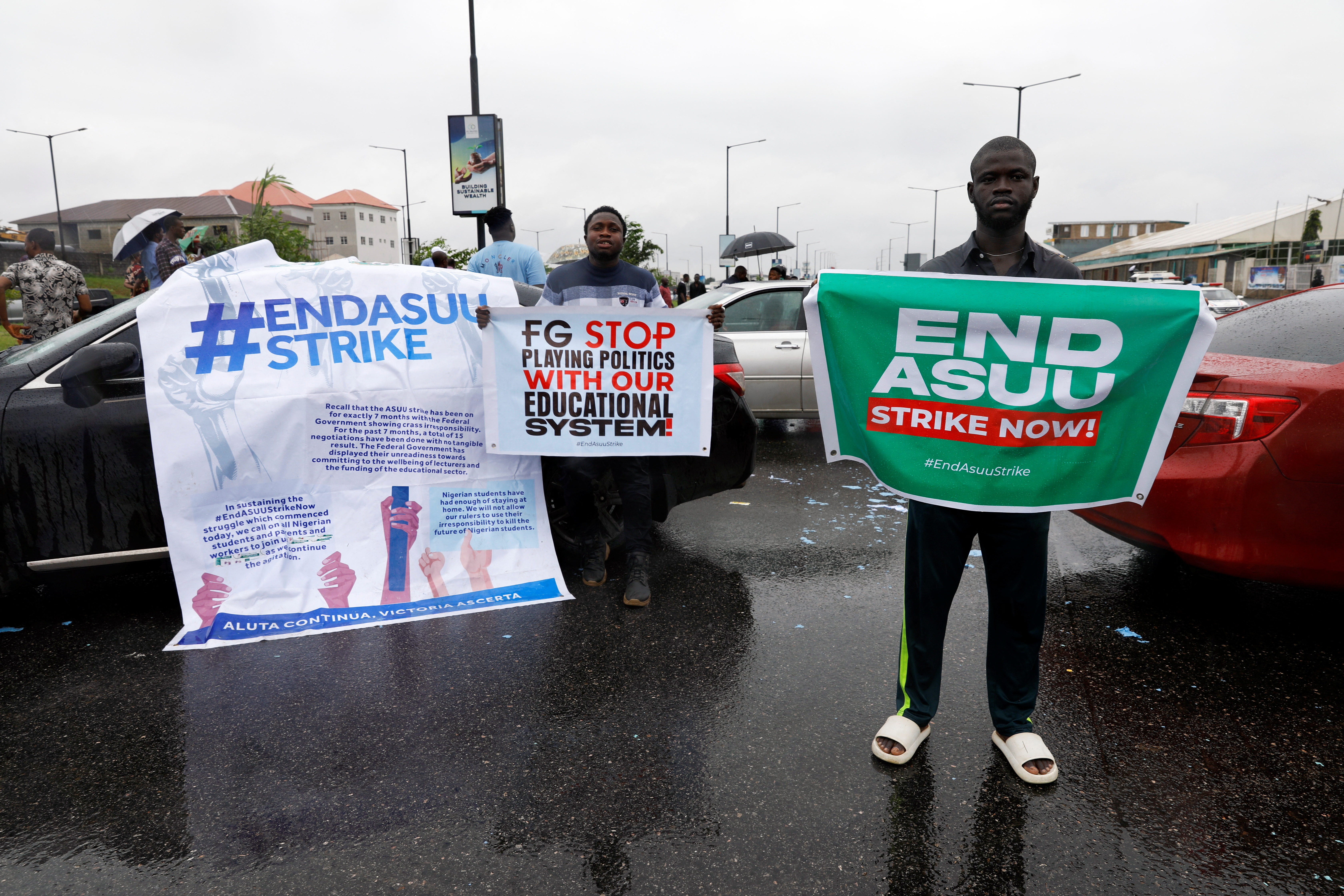Members of the National Association of Nigerian Students (NANS) staged a protest against prolonged strike action of the Academic Staff Union of Universities at the access road to the Murtala Muhammad International Airport in Lagos, Nigeria September 19, 2022. REUTERS/Temilade Adelaja