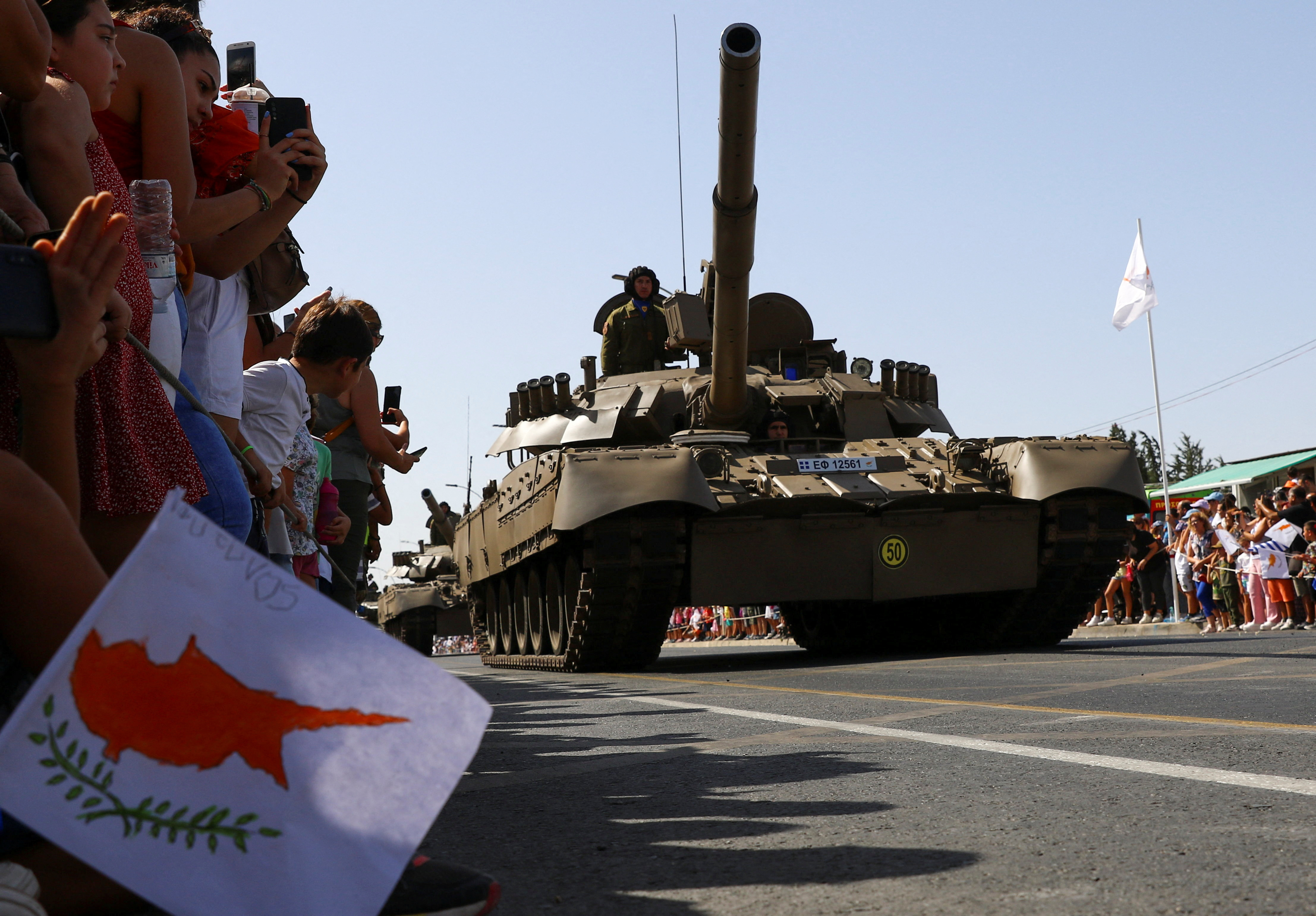 Cypriot army armoured vehicles participate in a military parade marking Cyprus' Independence Day in Nicosia, Cyprus