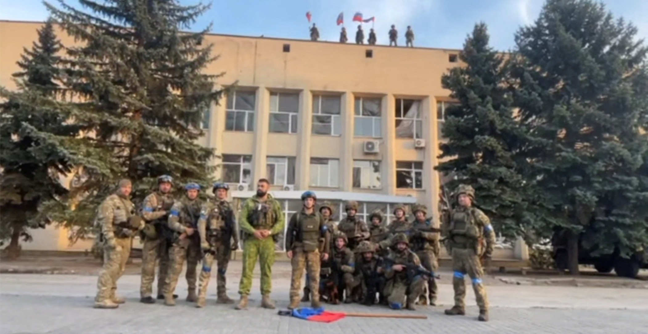 Ukrainian armed forces make a statement in front of Lyman Town Administration office, in Lyman, Ukraine