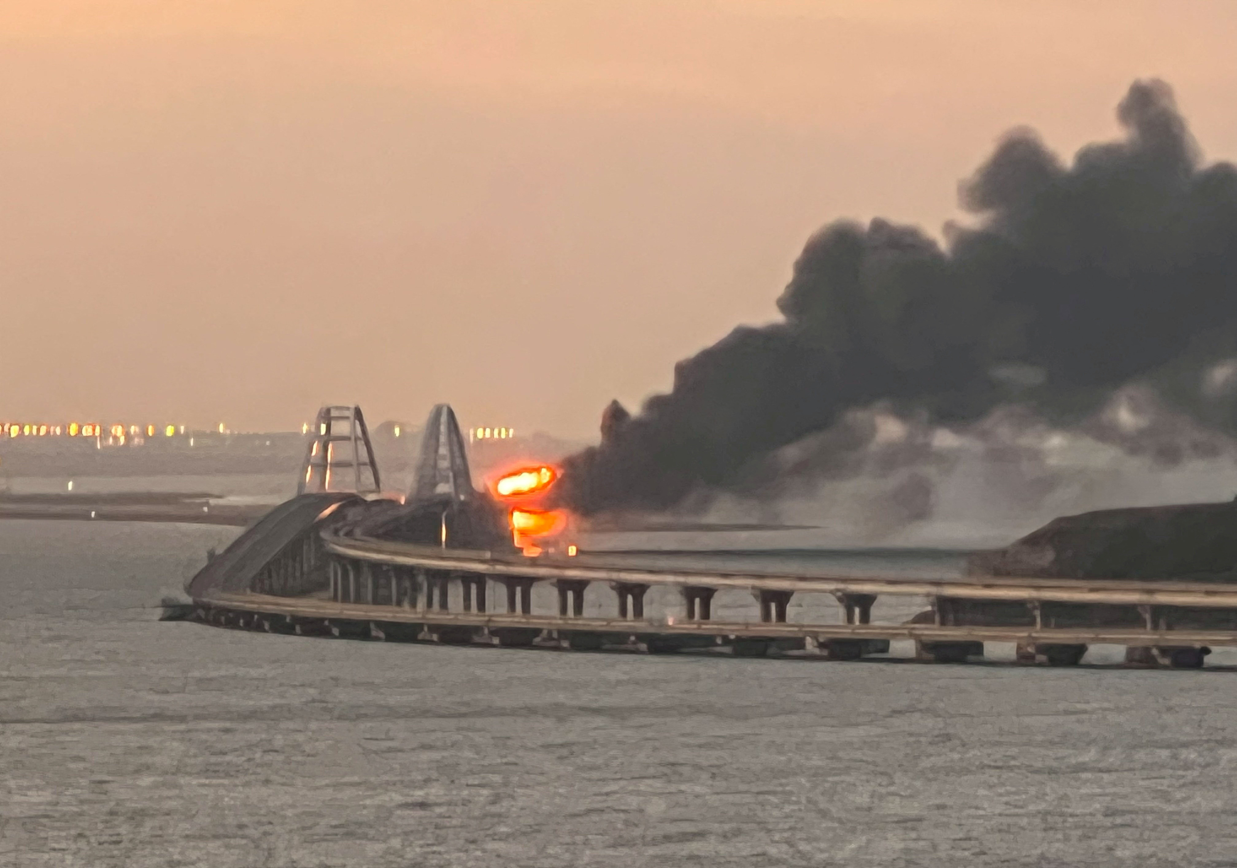 A view shows a fire on the Kerch bridge in Crimea