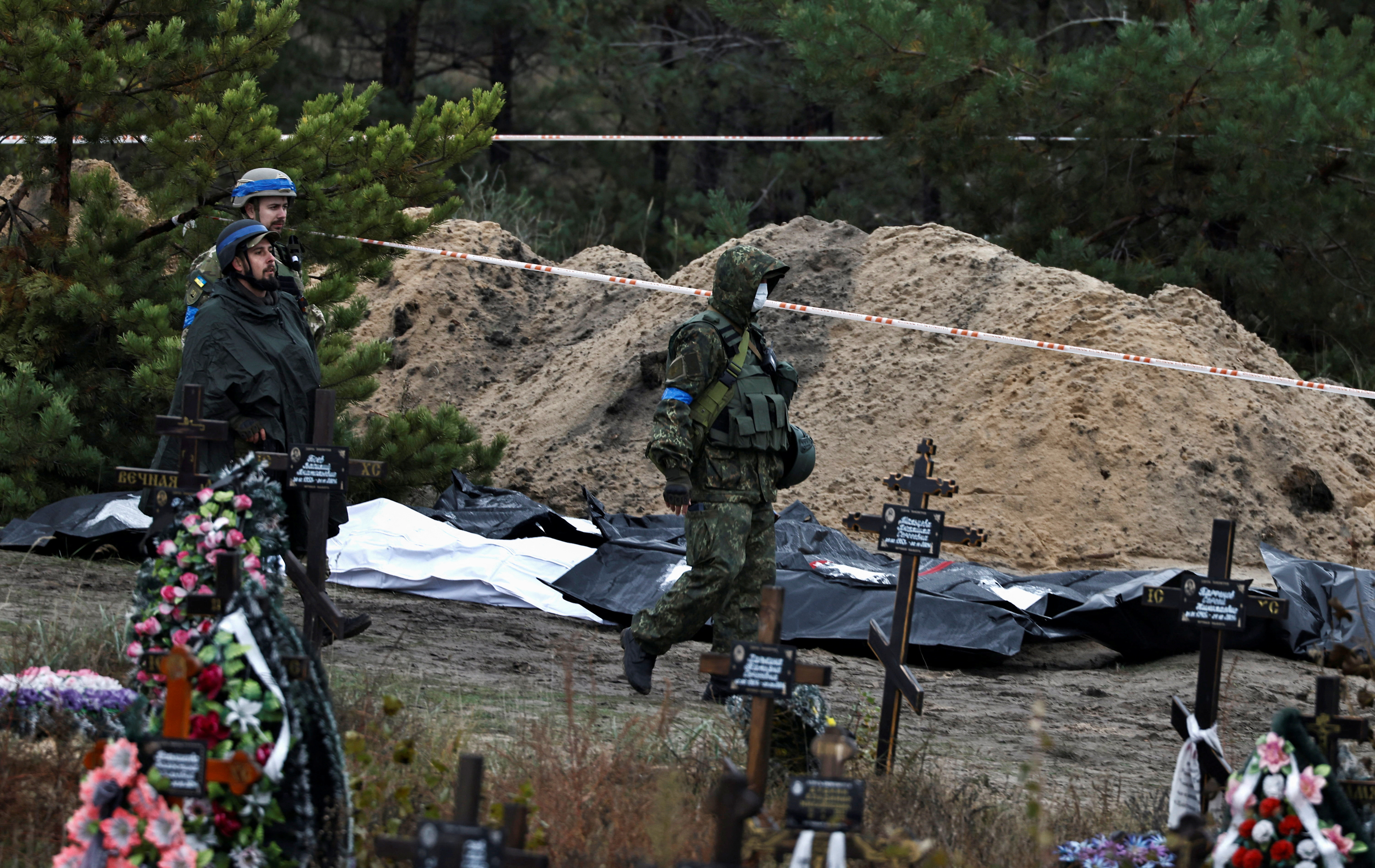mass grave in Lyman, Ukraine