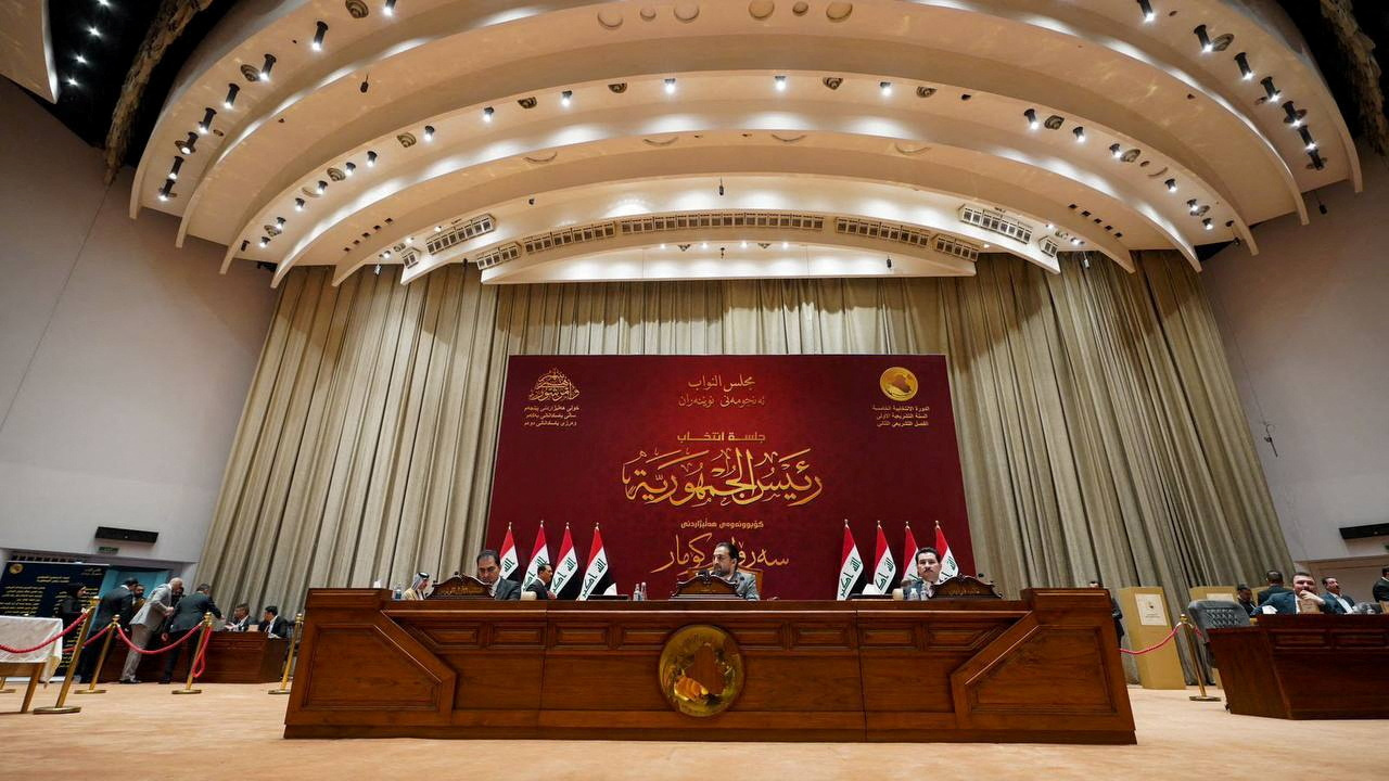 Iraqi lawmakers attend a parliamentary session to vote for a new head of state president