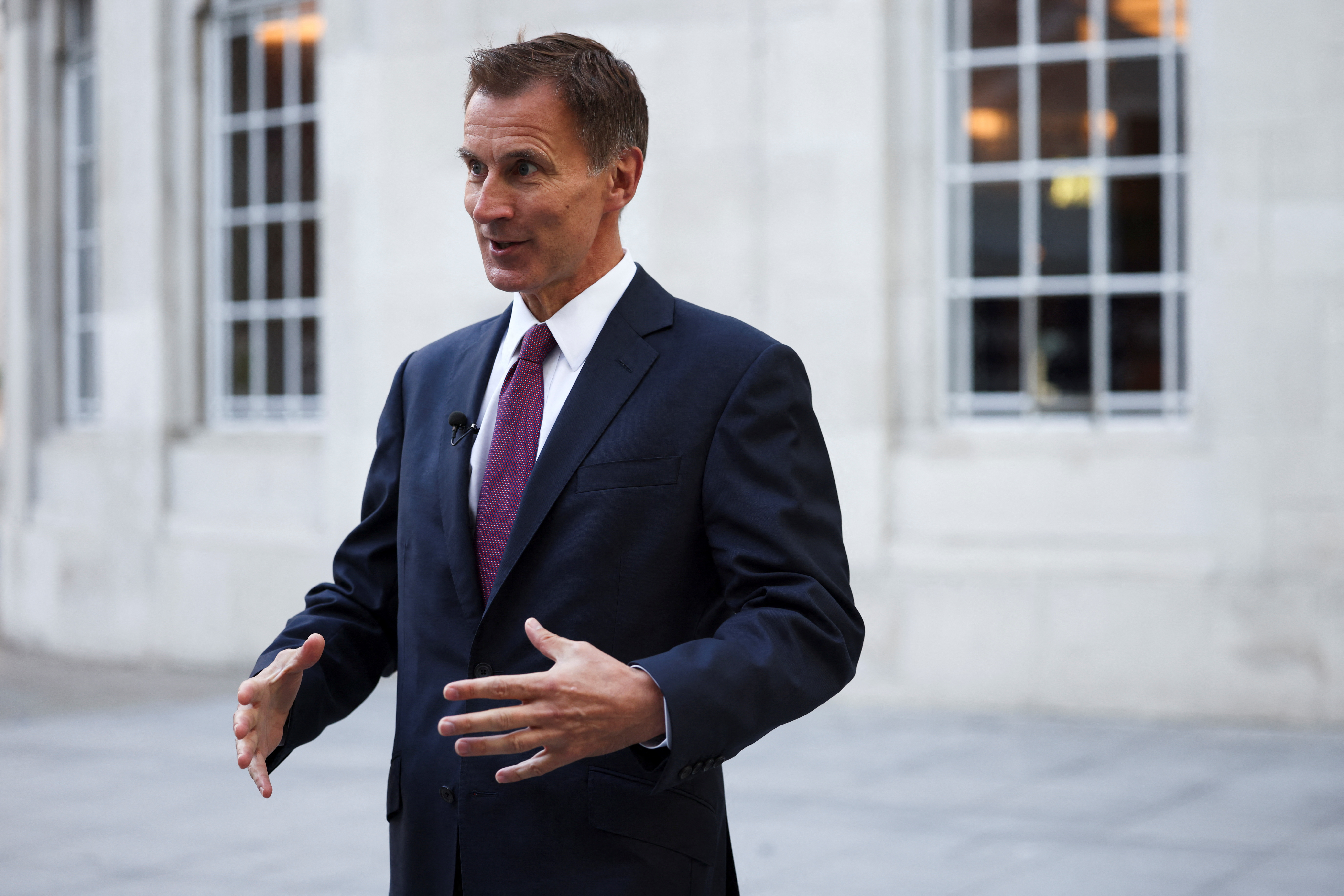 British Chancellor of the Exchequer Jeremy Hunt speaks during an interview