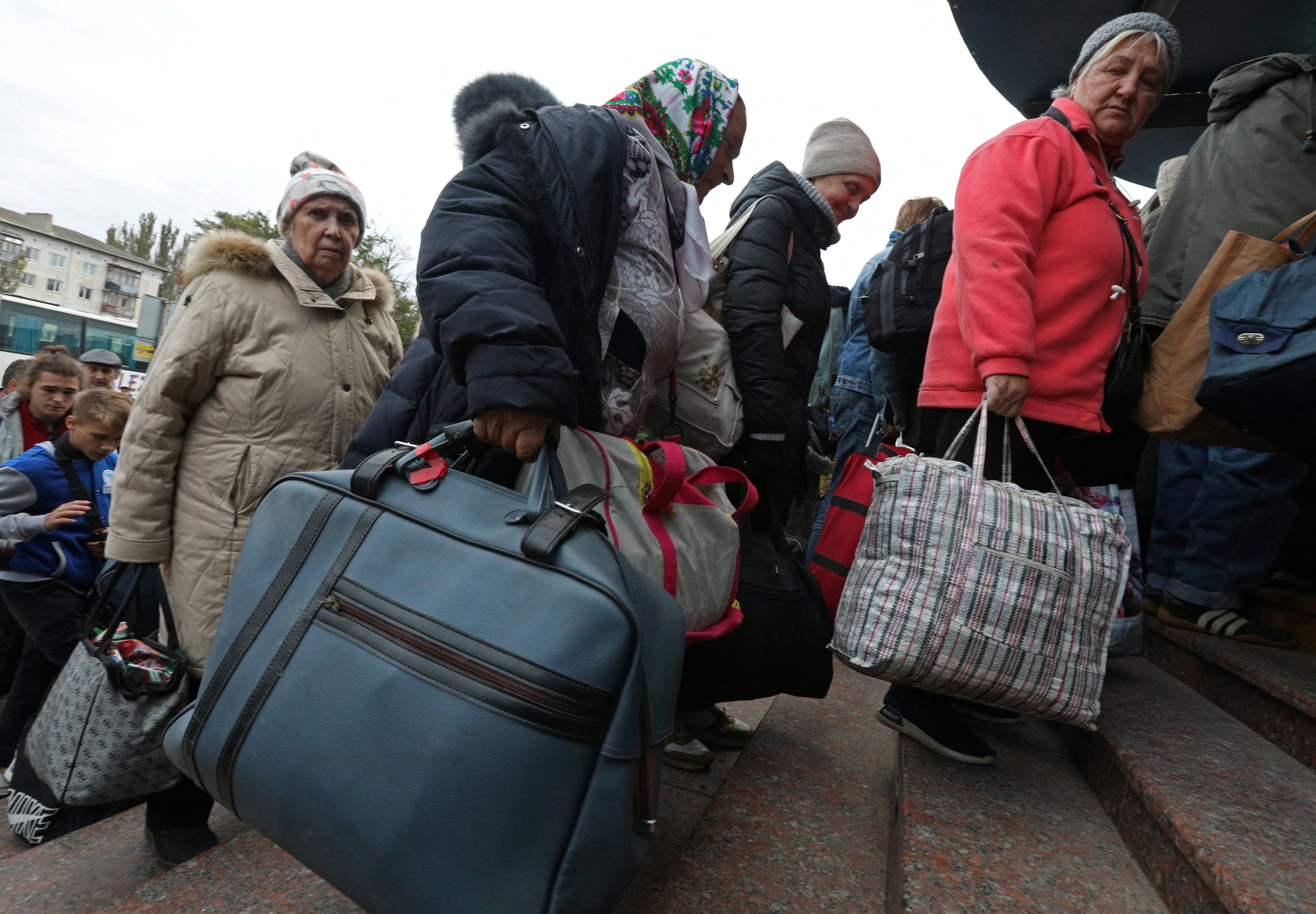 Civilians evacuated from the Russian-controlled city of Kherson