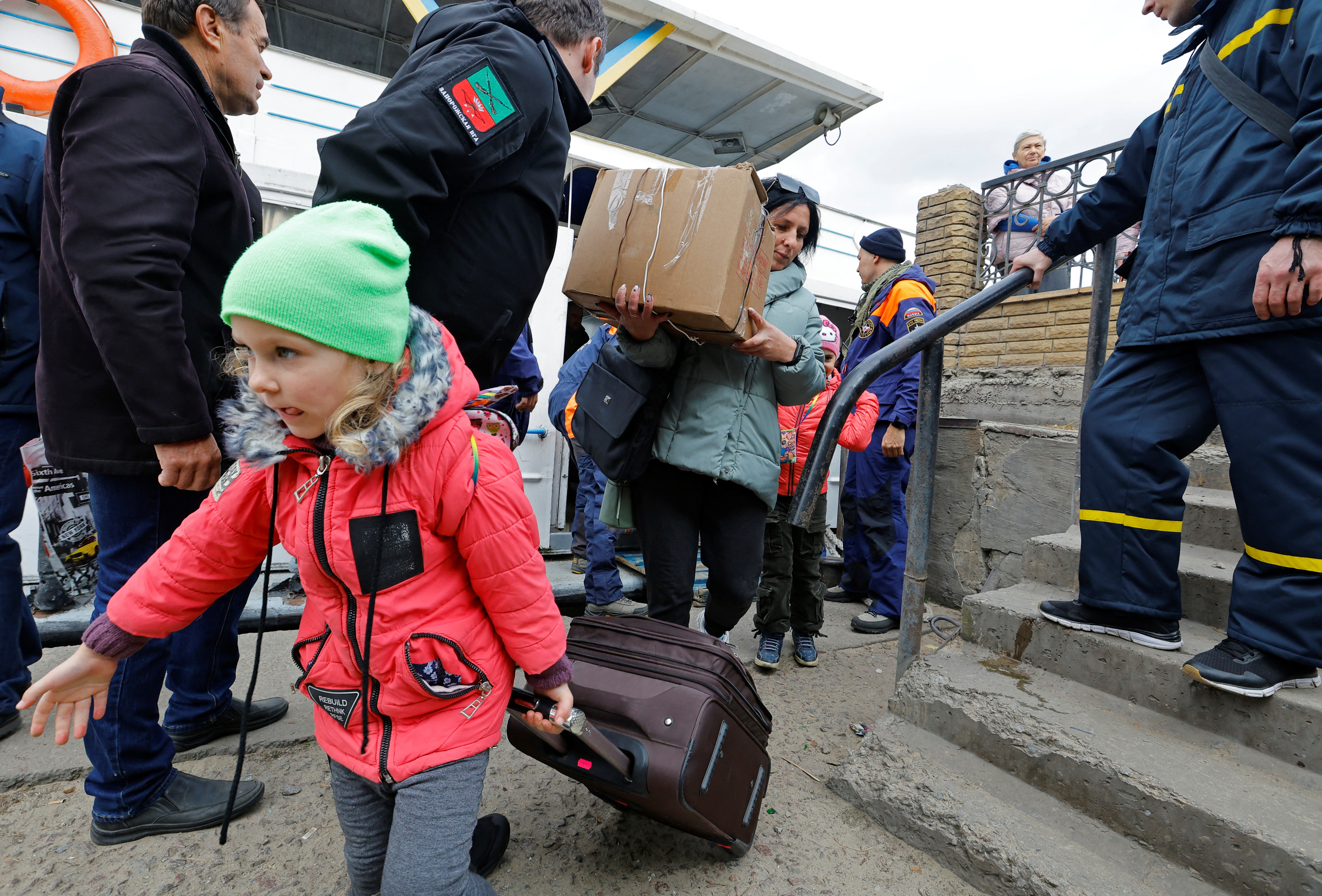 Civilians evacuated from the Russian-controlled city of Kherson