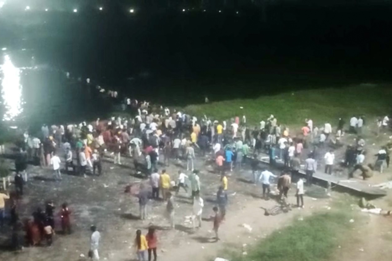 A view of the site after a suspension bridge collapses in India’s Gujarat state on October 30, 2022.