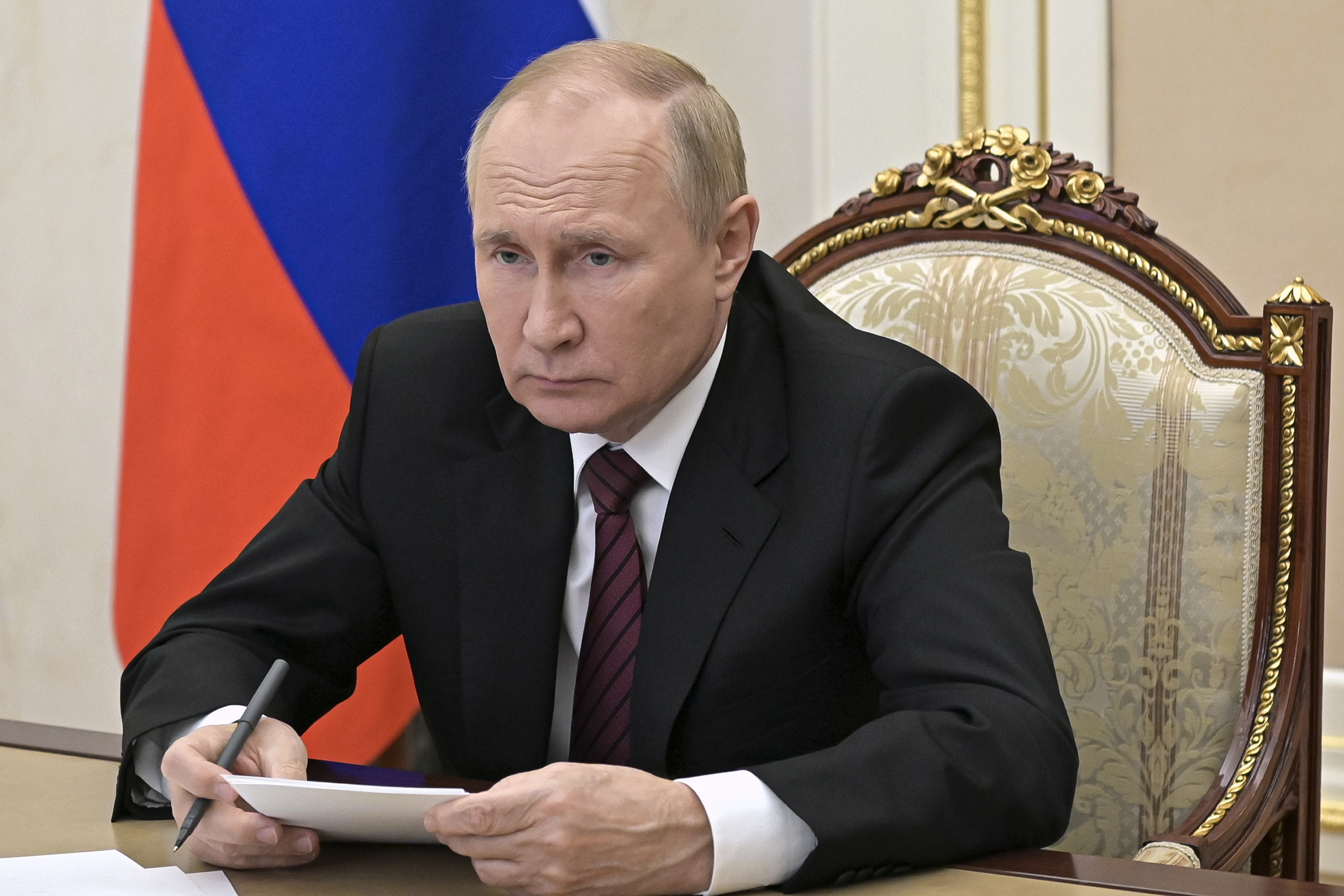Russian President Vladimir Putin leads a meeting via videoconference in Moscow, Russia, Tuesday, Oct. 25, 2022. (Alexei Babushkin, Sputnik, Kremlin Pool Photo via AP)