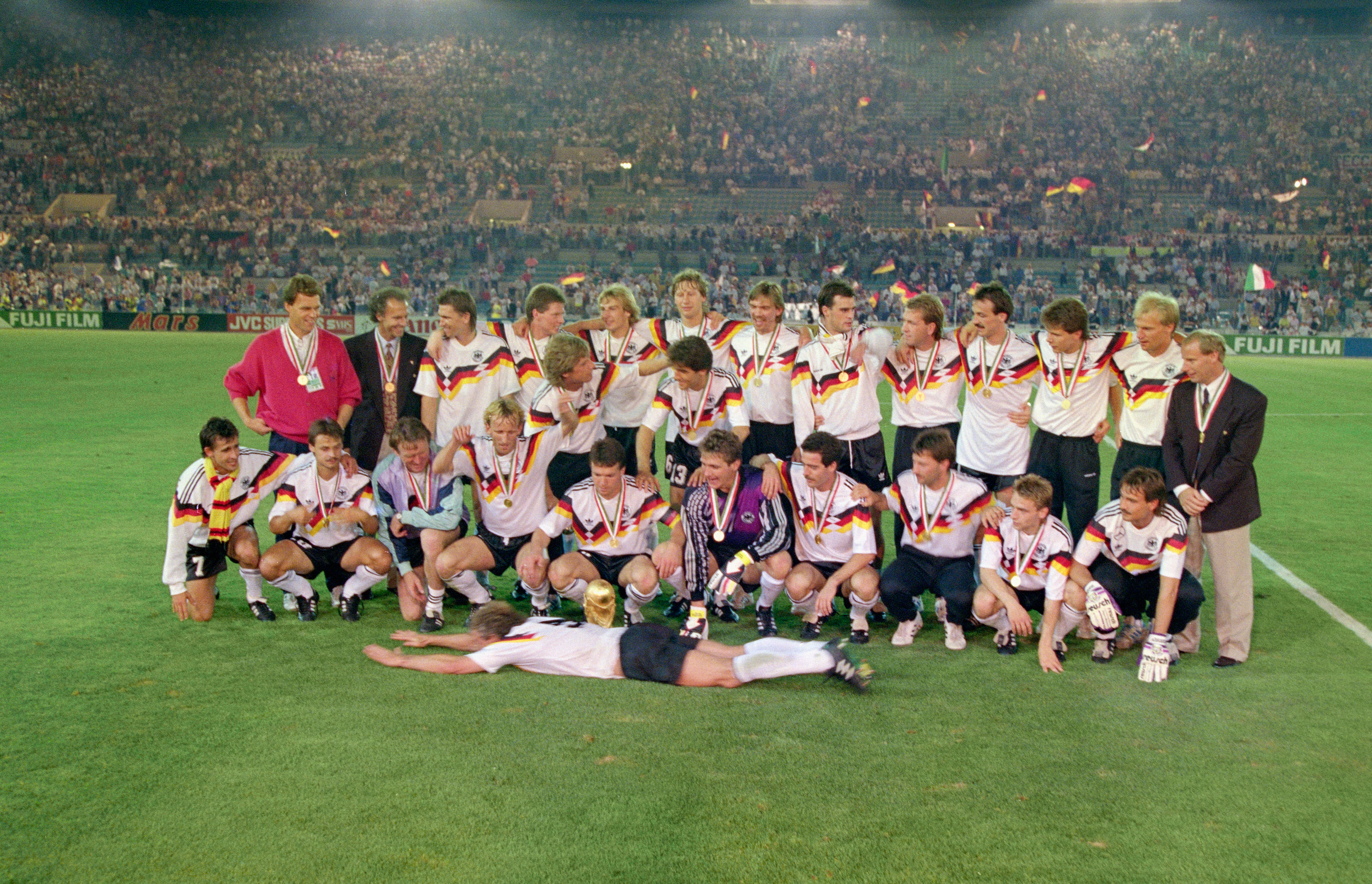 The West Germany team celebrate after the 1990 FIFA World Cup Final between West Germany and Argentina at Olympic Stadium on July 8, 1990 in Rome, Italy