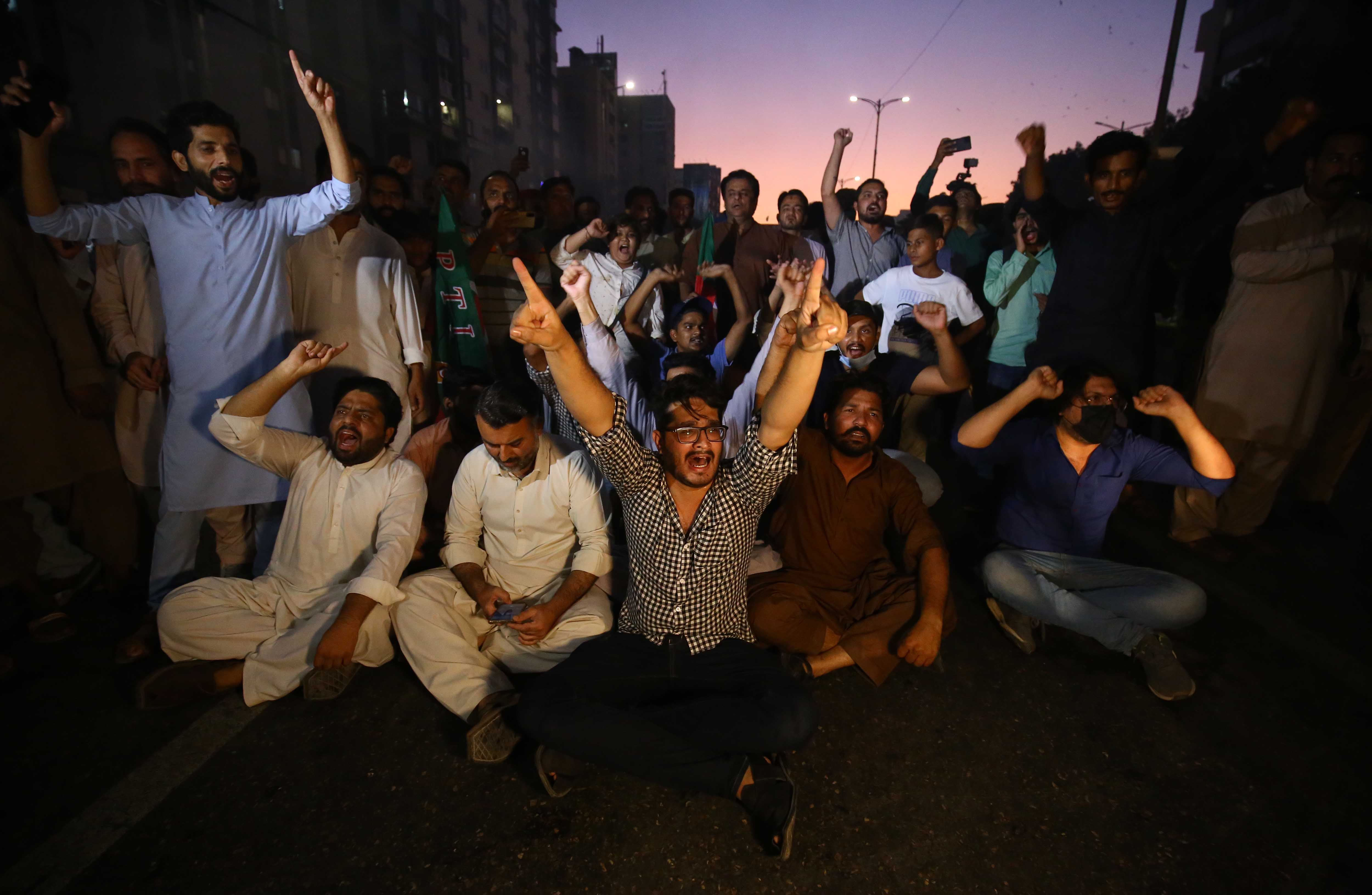 Supporters of former prime minister Imran Khan shout slogans