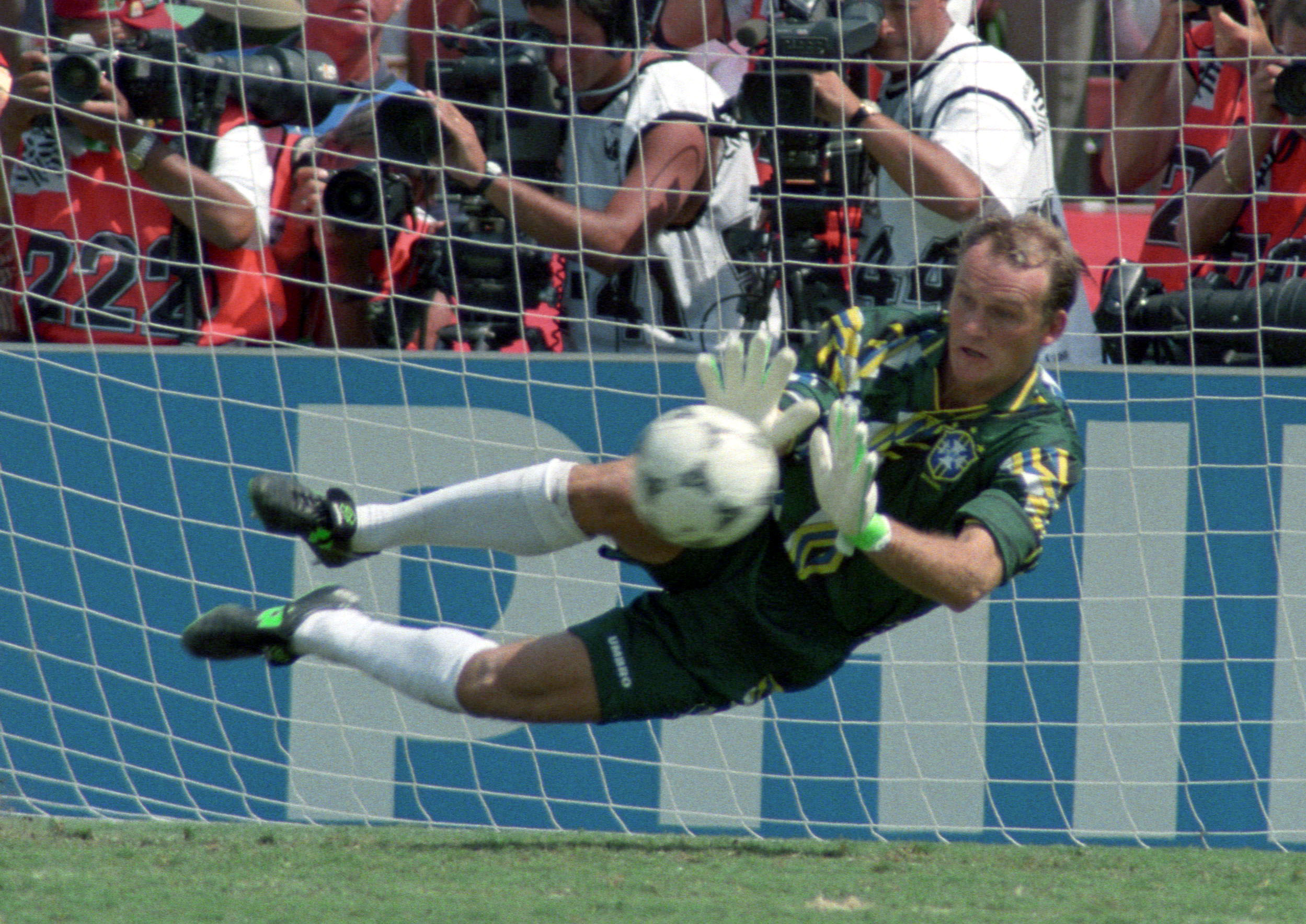 Claudio Taffarel makes a save on a shot by Italy's Daniele Massaro
