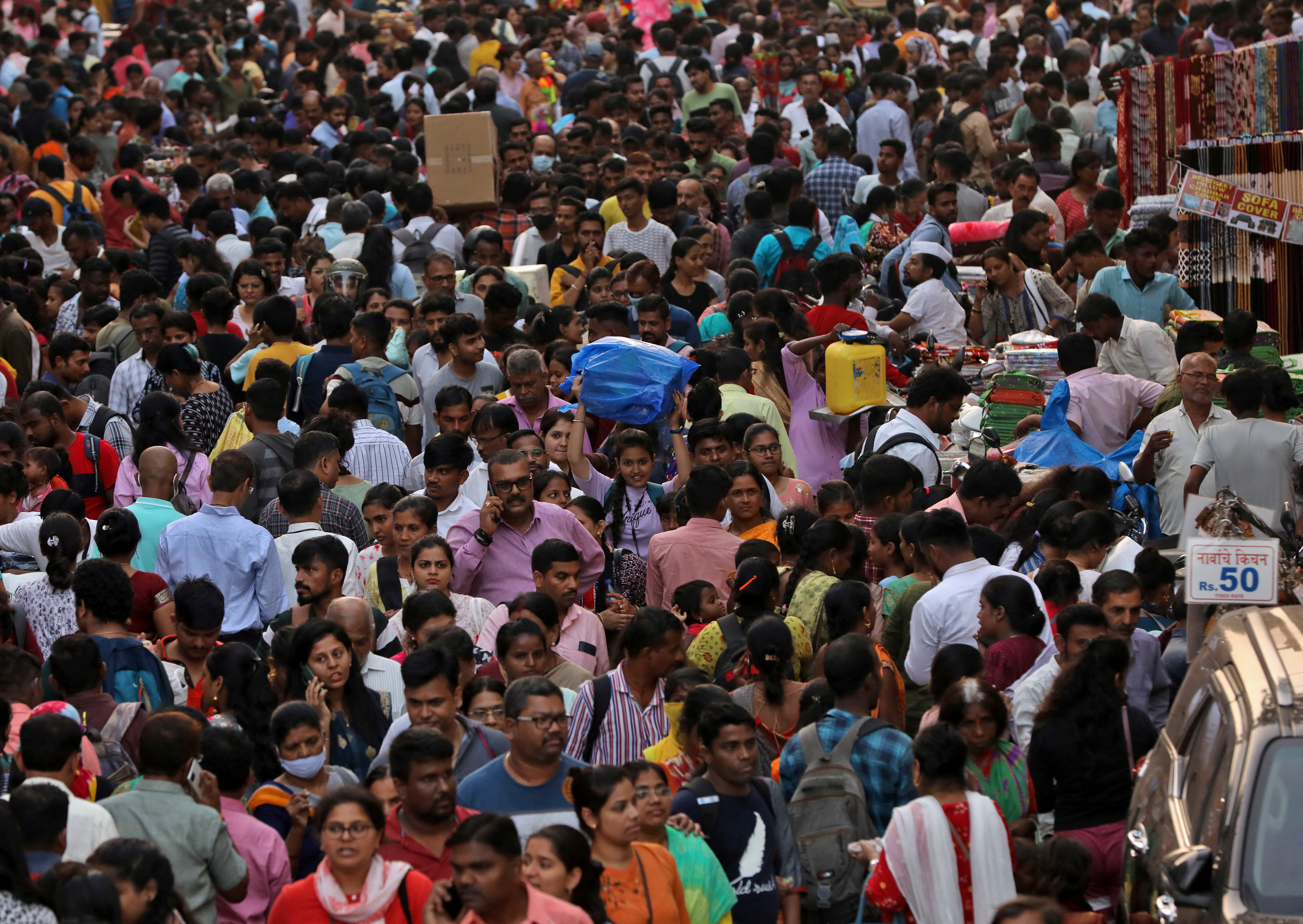 Shoppers crowd at a market place ahead of the Hindu festival of Diwali in Mumbai, India, October 22, 2022.
