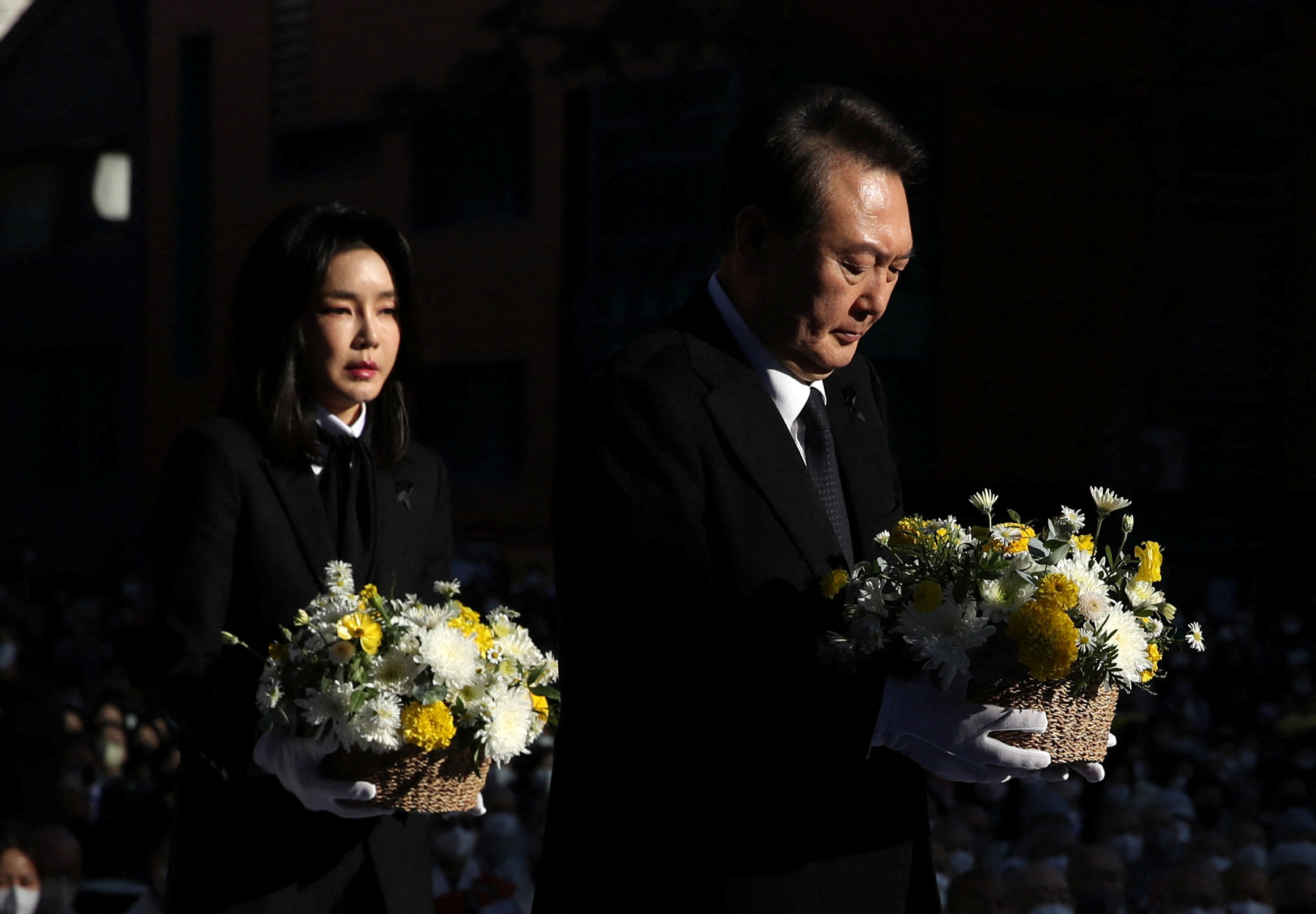 South Korean President Yoon Suk-yeol and his wife Kim Keon-hee attend a Buddhist ceremony commemorating the victims of a crowd crush that happened during Halloween festivities.