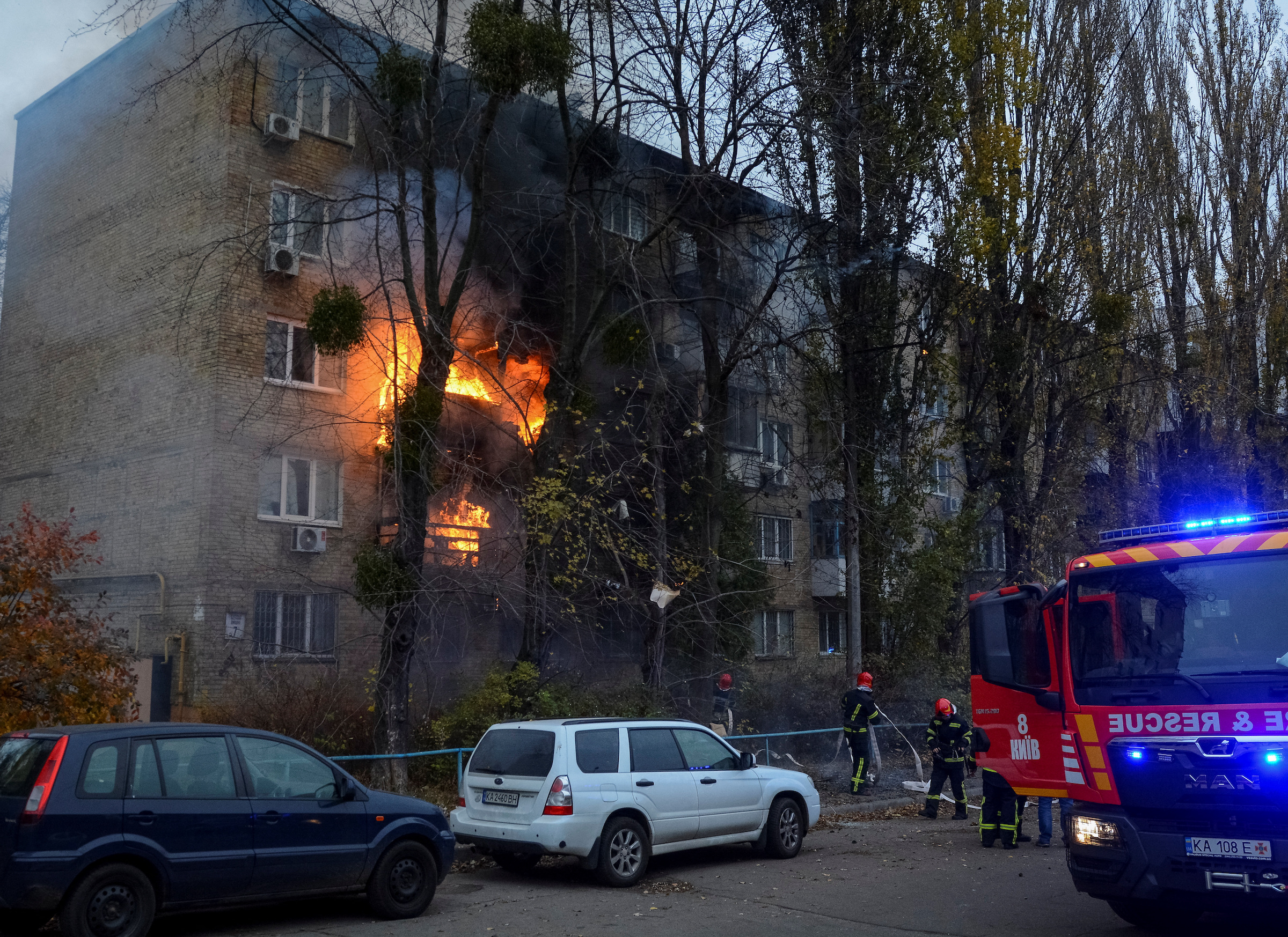 Building in Kyiv in fire after it was struck by a Russian missile.