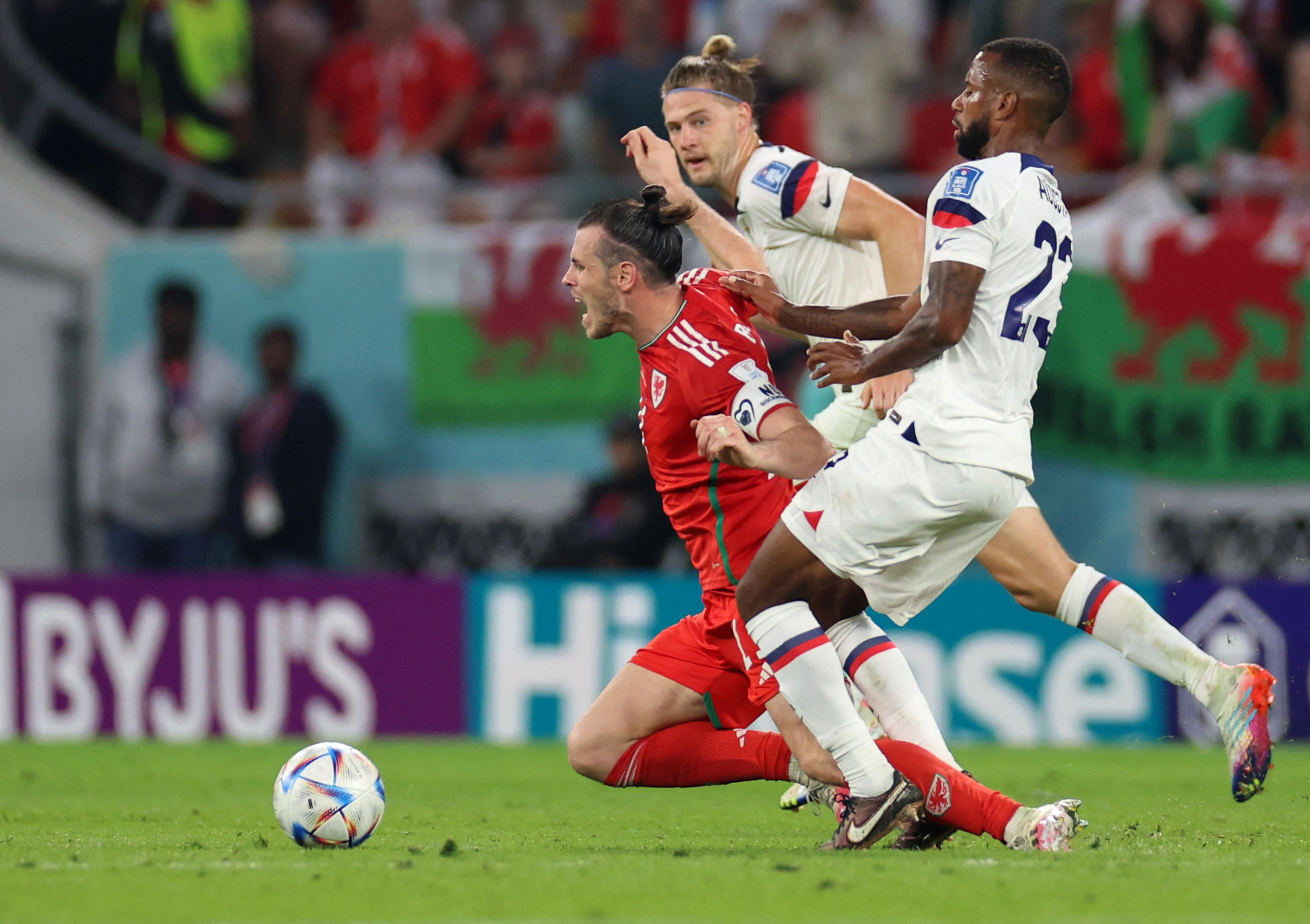 Wales' Gareth Bale is fouled by Kellyn Acosta