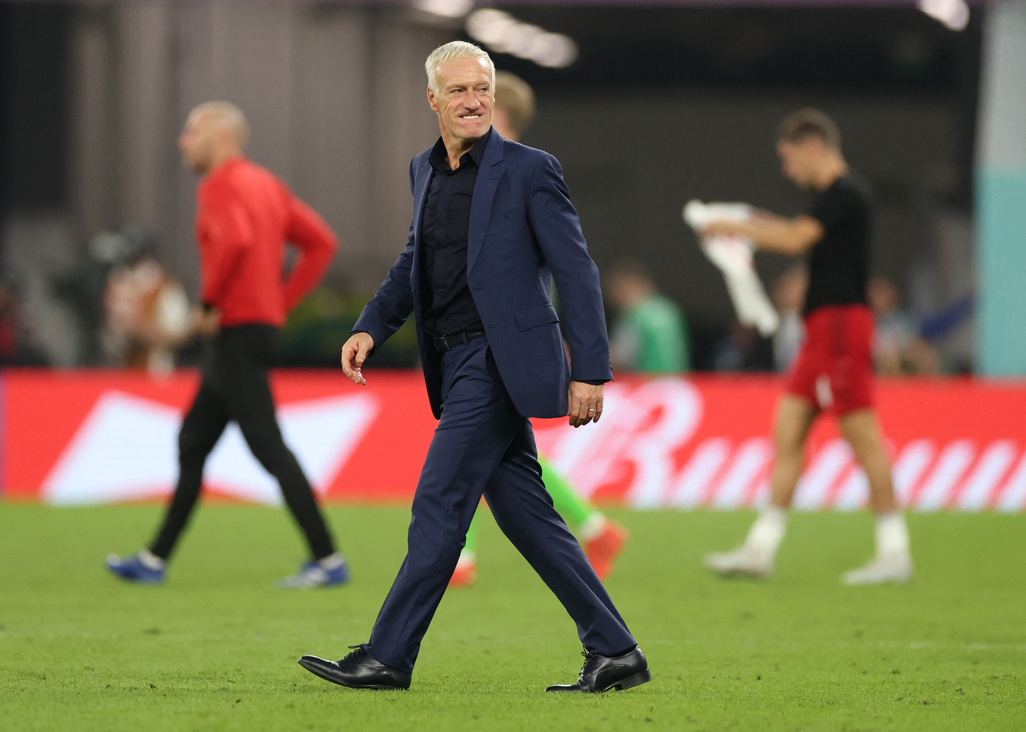 Didier Deschamps celebrates after the match