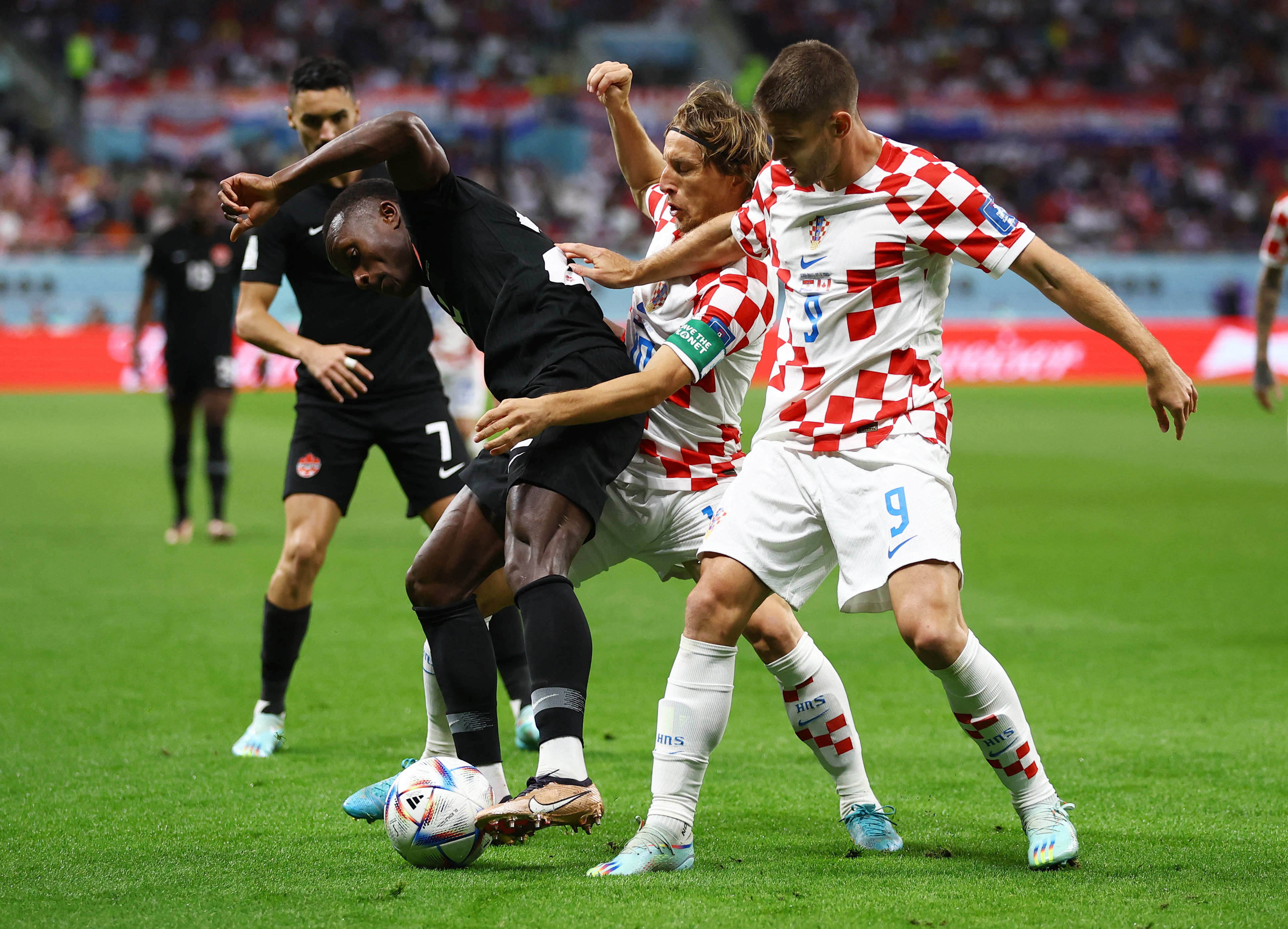 Canada's Richie Laryea in action with Croatia's Luka Modric