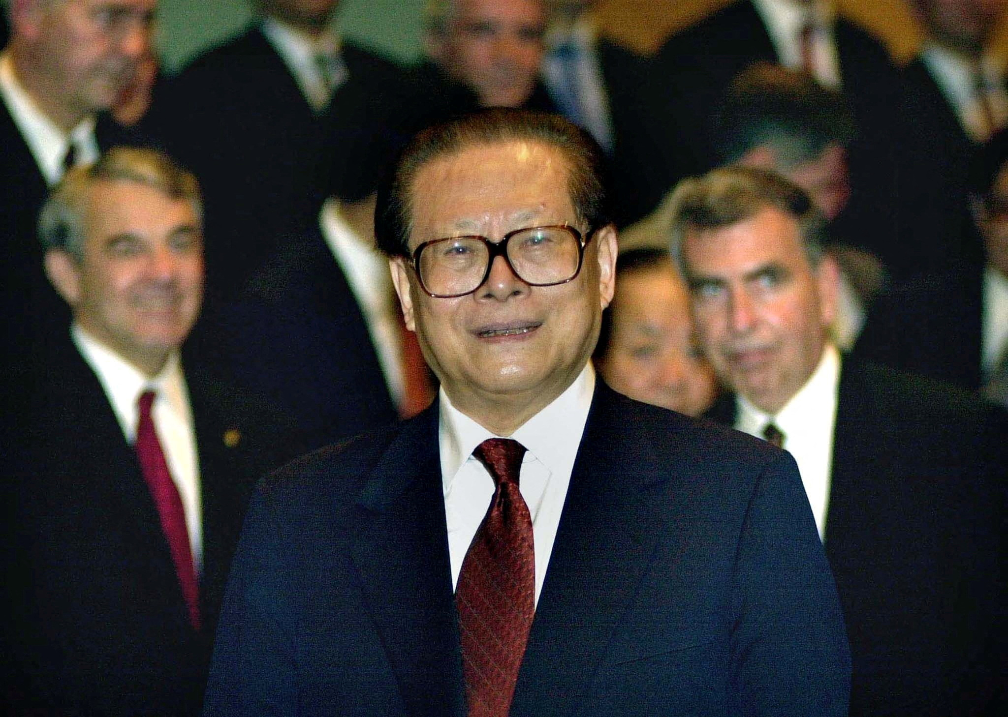 Chinese President Jiang Zemin smiles during a meeting with corporate executives attending the Fortune Global Forum in Hong Kong, China May 8, 2001. P