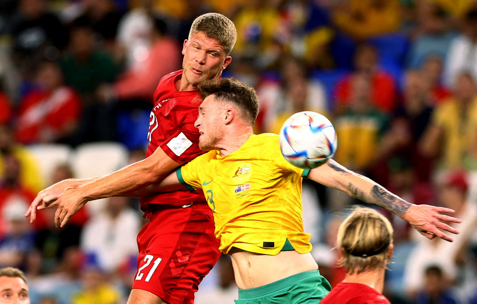 Andreas Cornelius in action with Australia's Harry Souttar