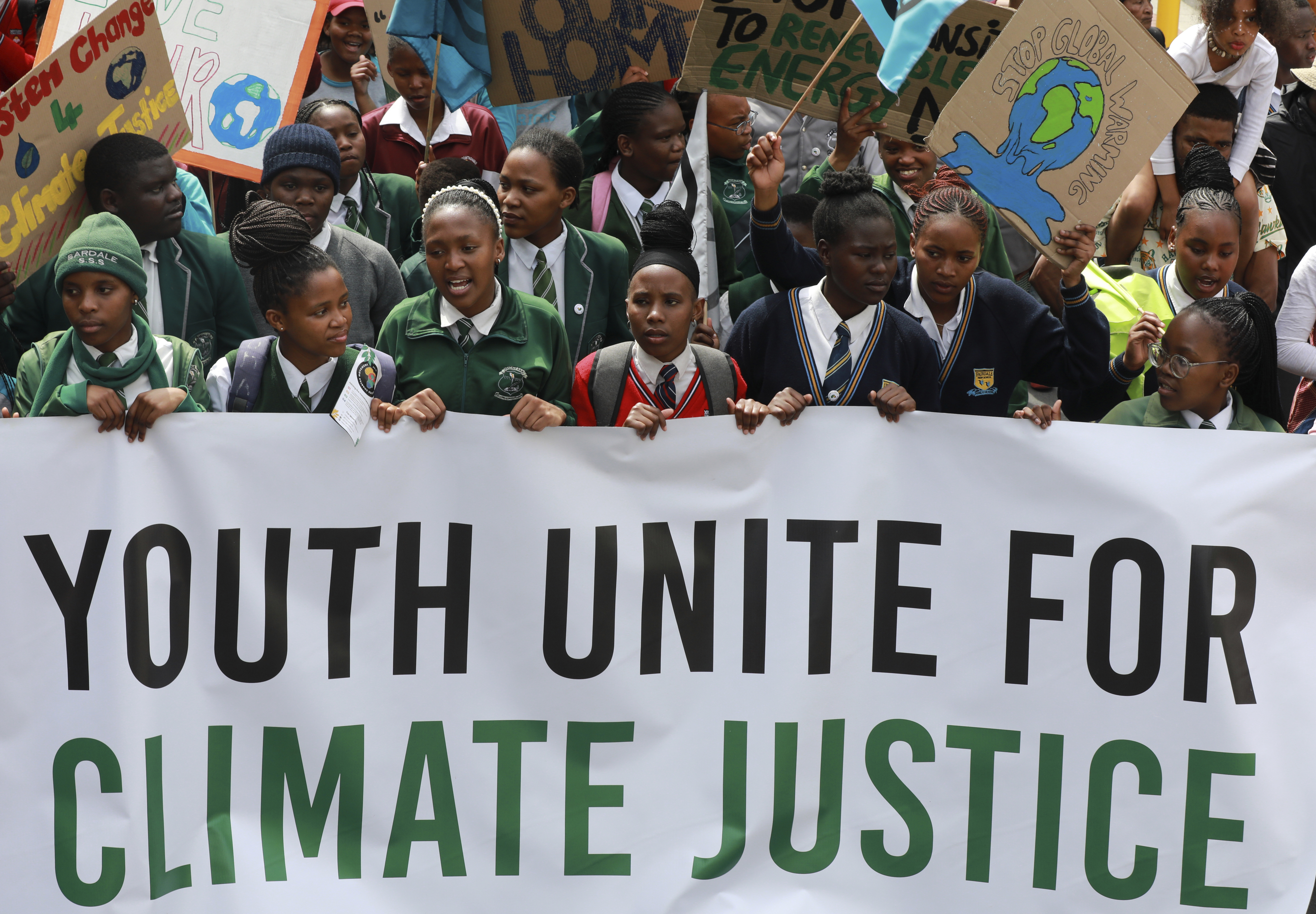 Young people take part in a protest calling for the government to take immediate action against climate change in Cape Town, South Africa, Saturday, Sept. 24, 2022. (AP Photo/Nardus Engelbrecht)
