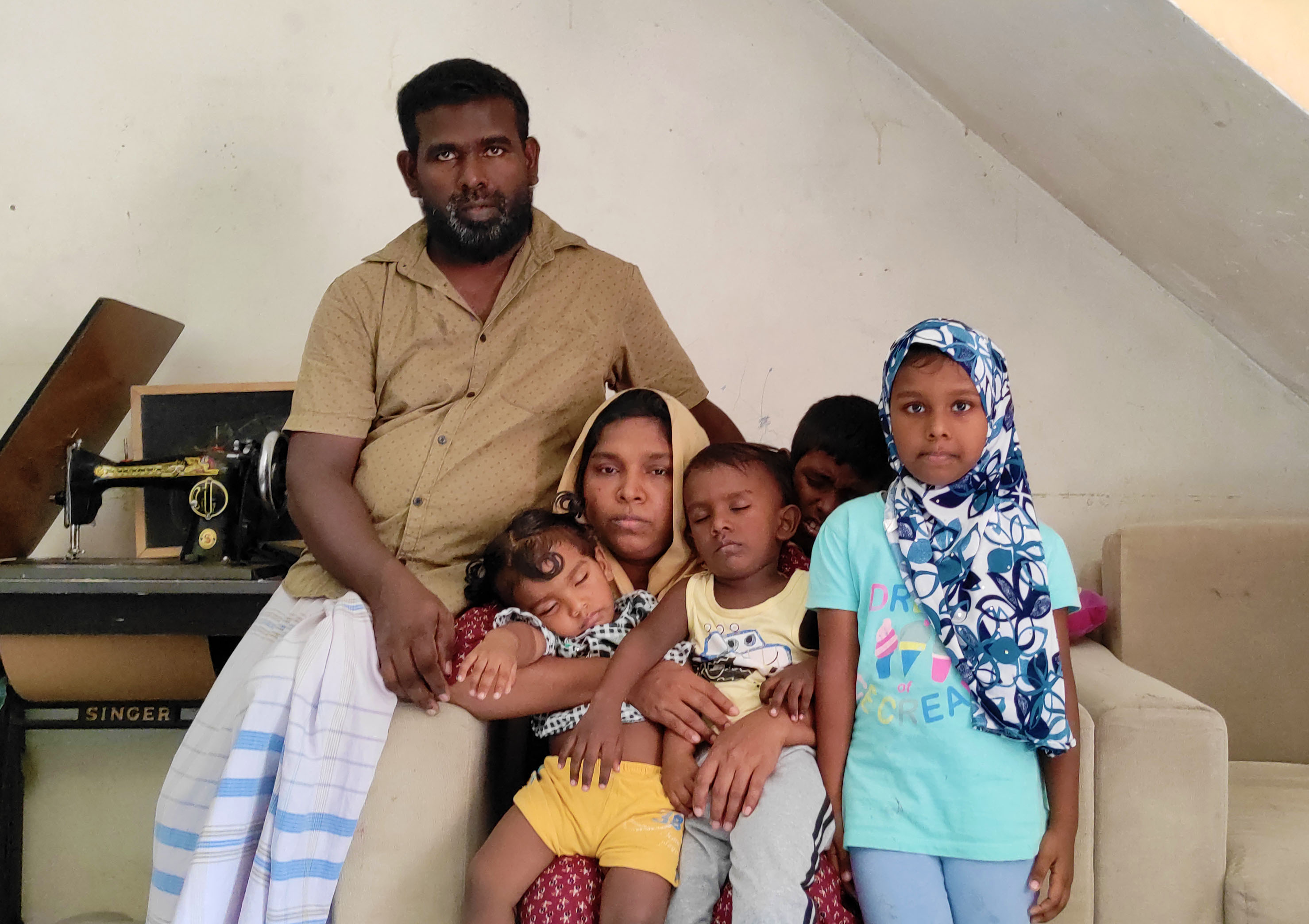 A family of six in their home in Colombo, Sri Lanka