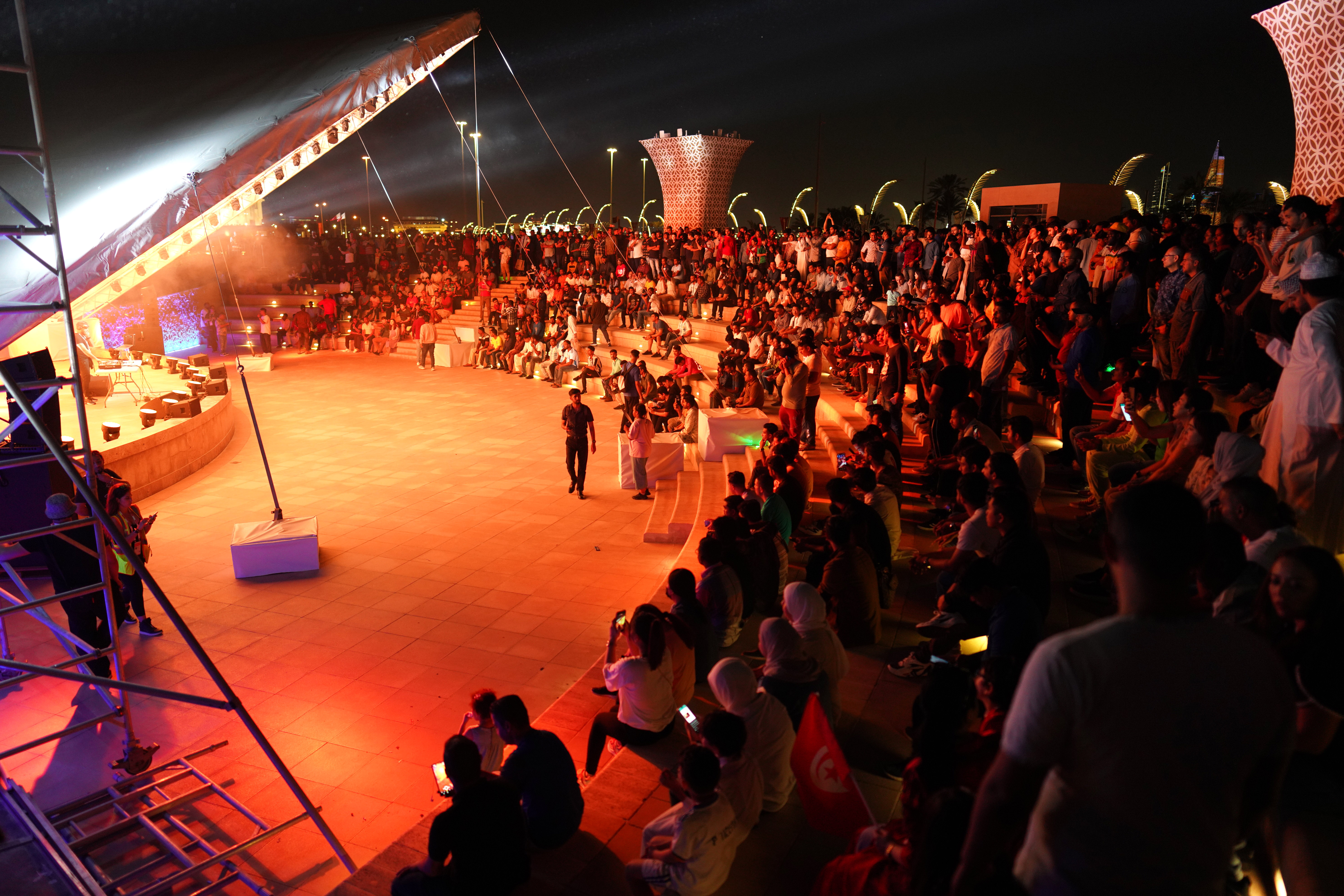 listening to DJs play techno music and enjoying light shows