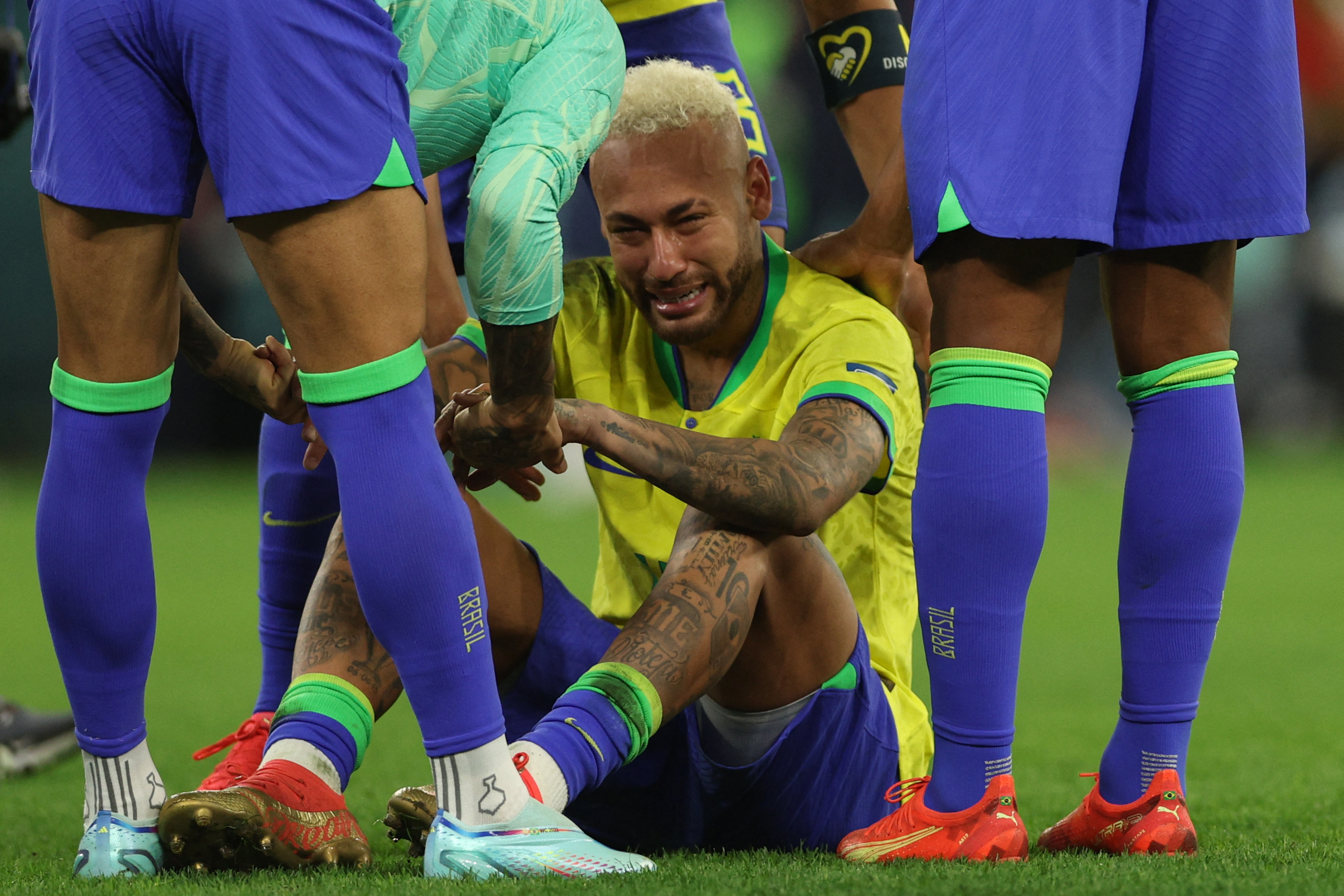 Brazil's forward #10 Neymar reacts after his team lost the Qatar 2022 World Cup quarter-final football match between Croatia and Brazil at Education City Stadium in Al-Rayyan, west of Doha, on December 9, 2022. (Photo by Adrian DENNIS / AFP)
