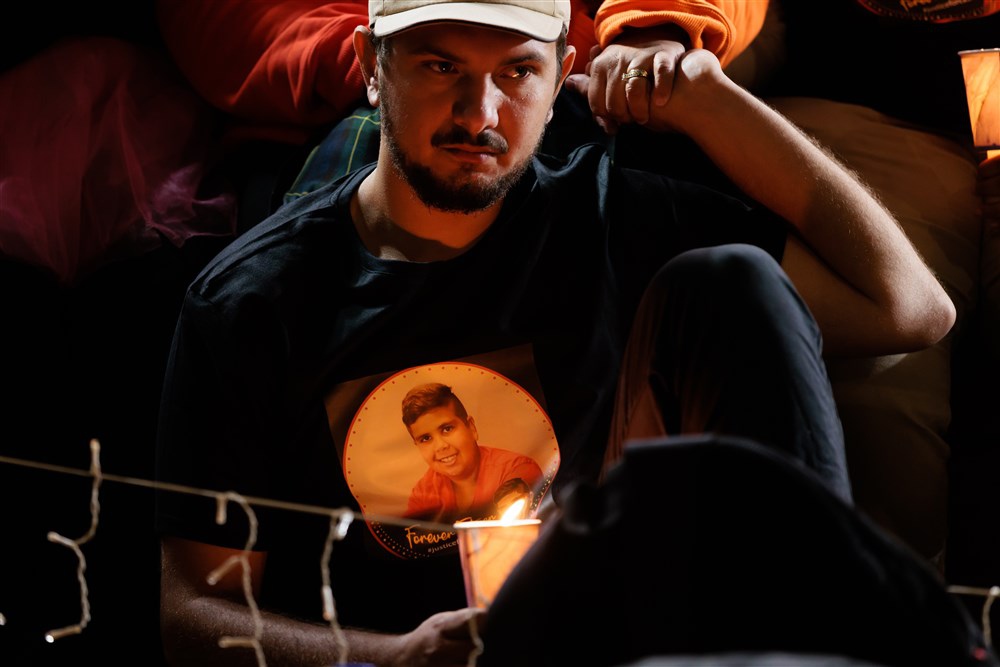 epa10276907 Family, friends and members of the public gather during a vigil for Cassius Turvey at Midland Oval in Perth, Australia, 31 October 2022. Cassius Turvey, a 15-year-old Indigenous boy, was allegedly bashed with a metal pole while walking home from school with friends in Middle Swan in October 2022. He later died at hospital from his injuries. EPA-EFE/RICHARD WAINWRIGHT AUSTRALIA AND NEW ZEALAND OUT